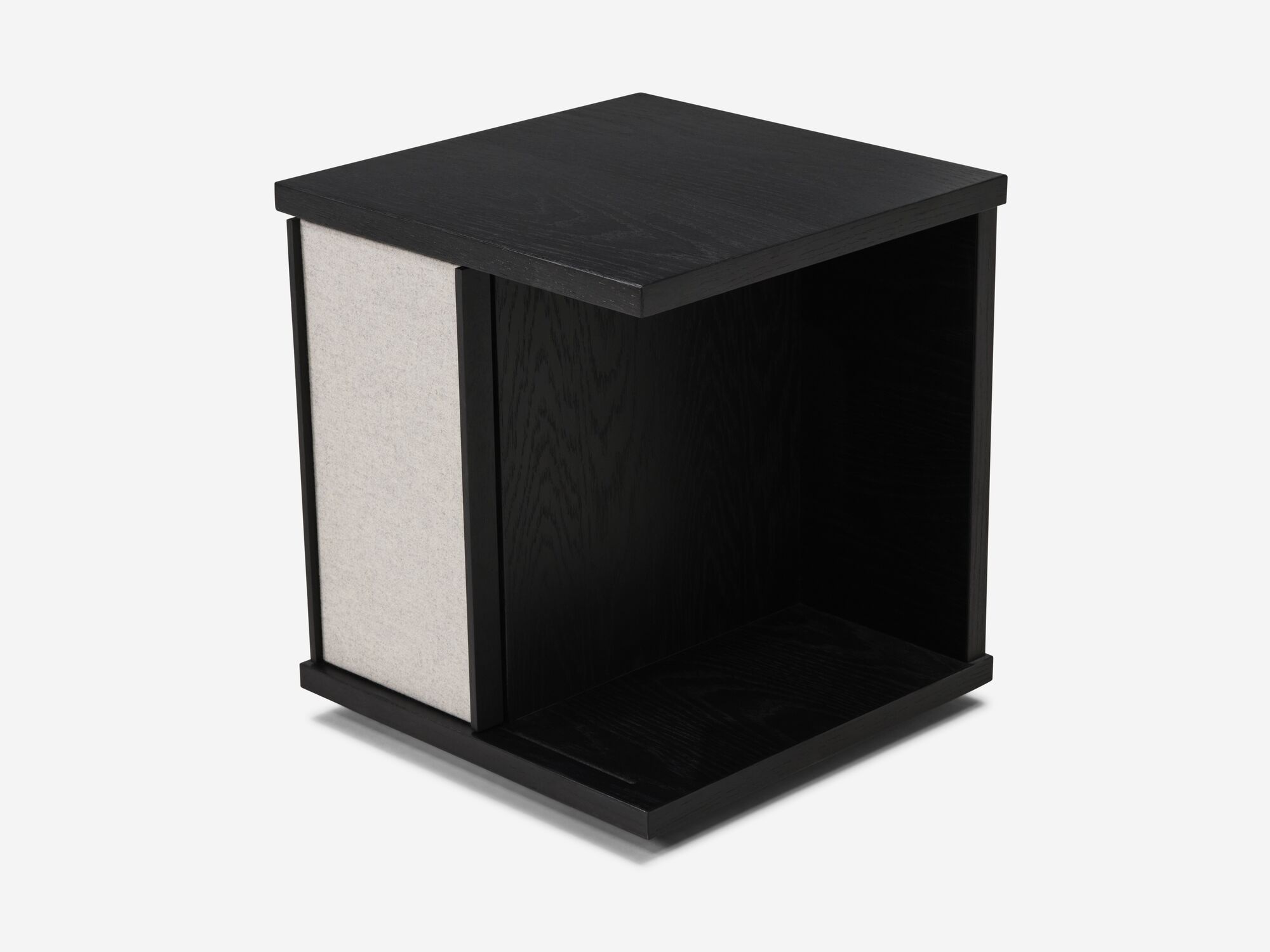 Detail left view of the Plank accent table canada in black oak with fabric panels