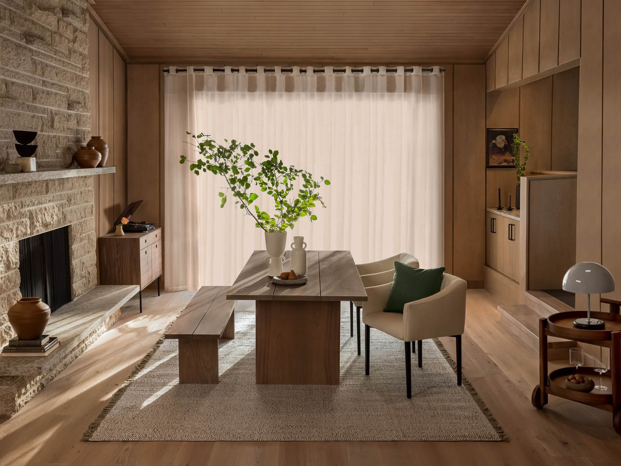 Walnut dining bench with matching table in mid century inspired dining room