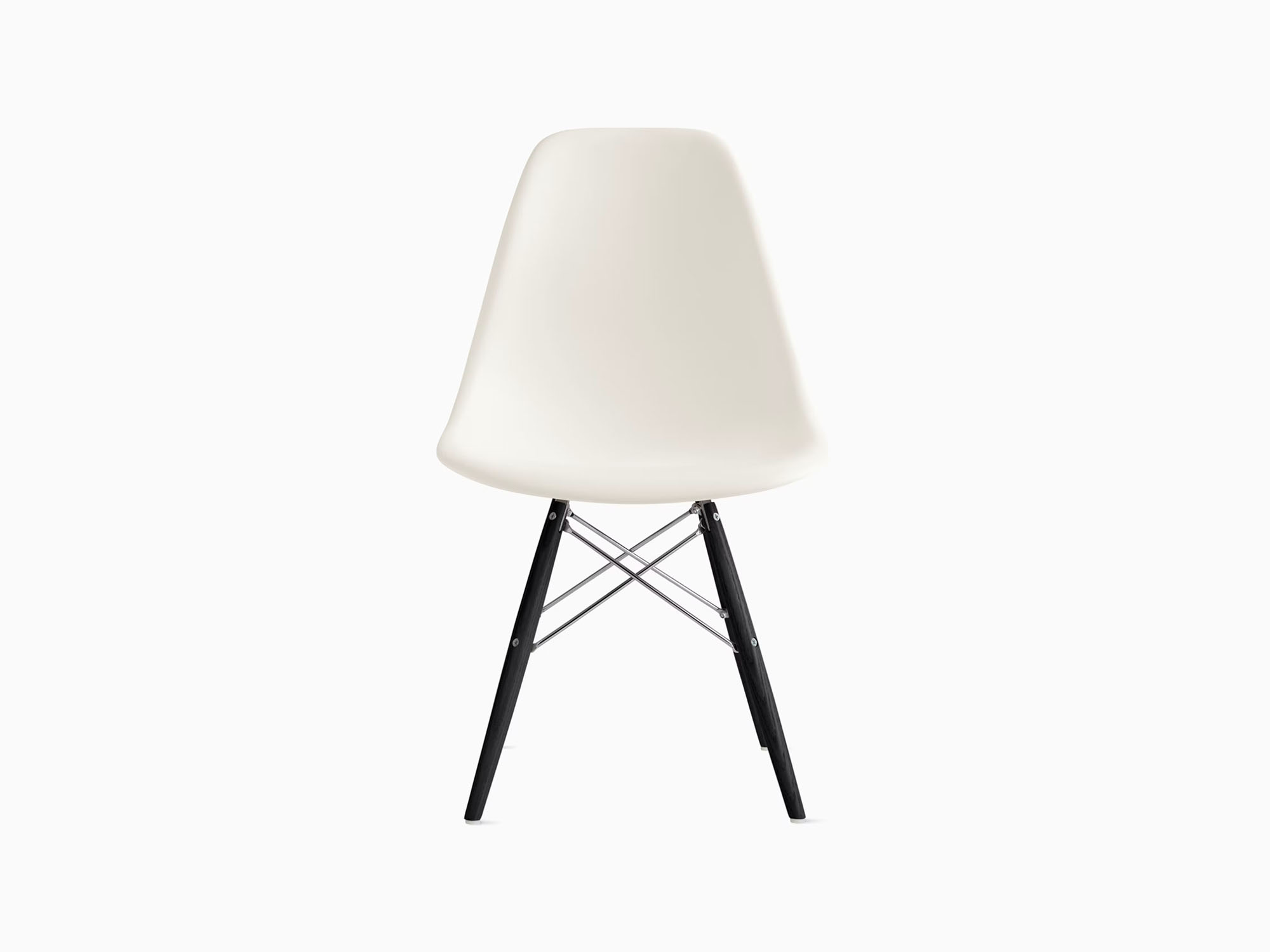 Front view of white plastic chair with black dowels