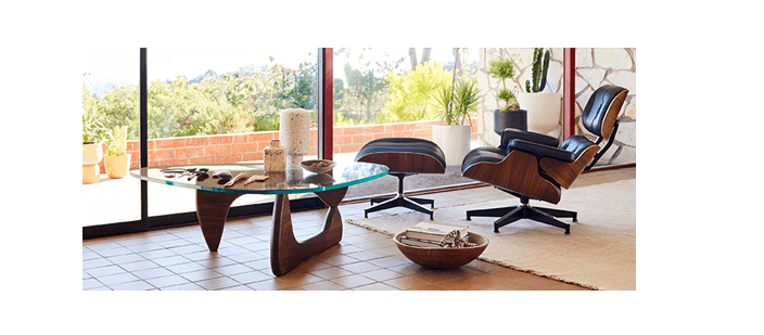 Eames lounge chair and ottoman in bright white living space