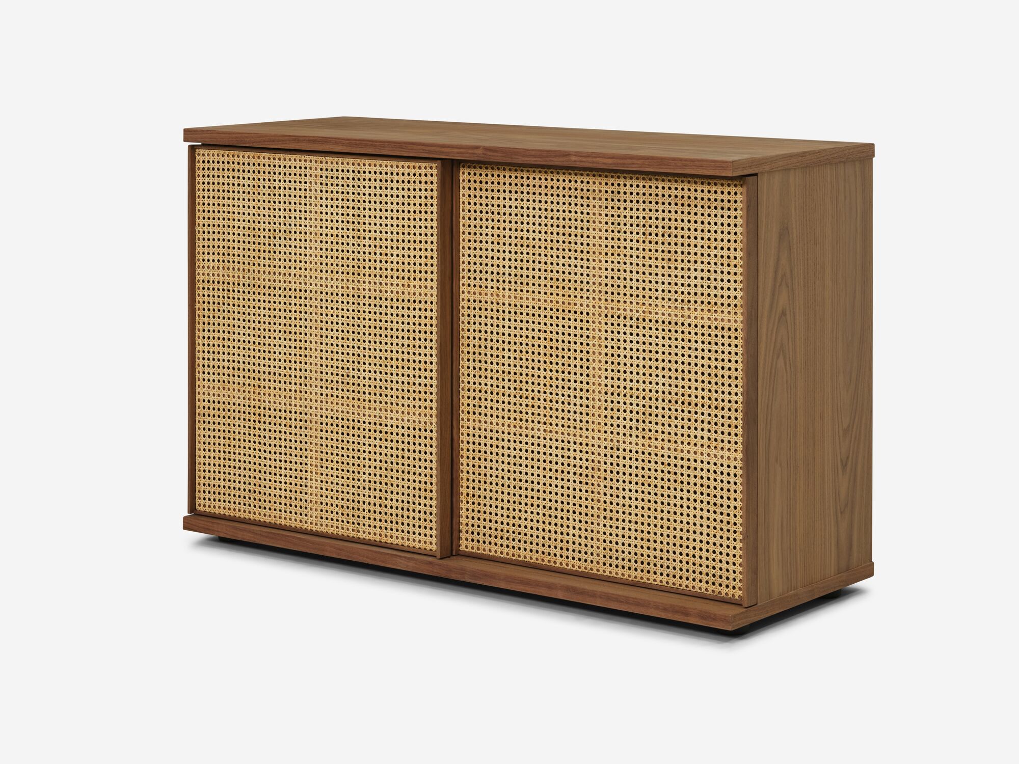 Front angle view of small walnut office cabinet with cane screens