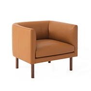 Front angle view of brown leather accent chair