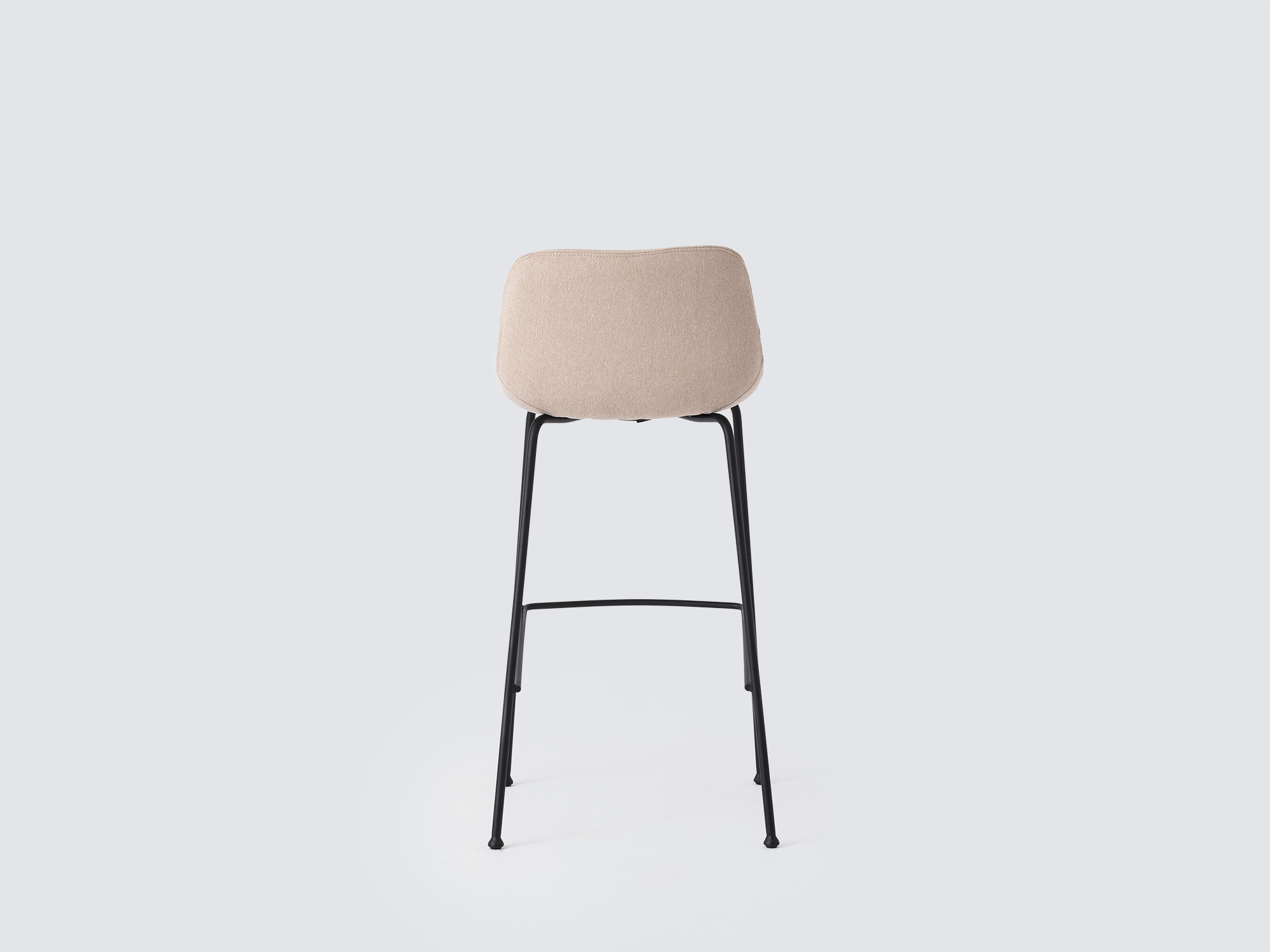 Back view of the Oles counter height bat stool with beige fabric seat