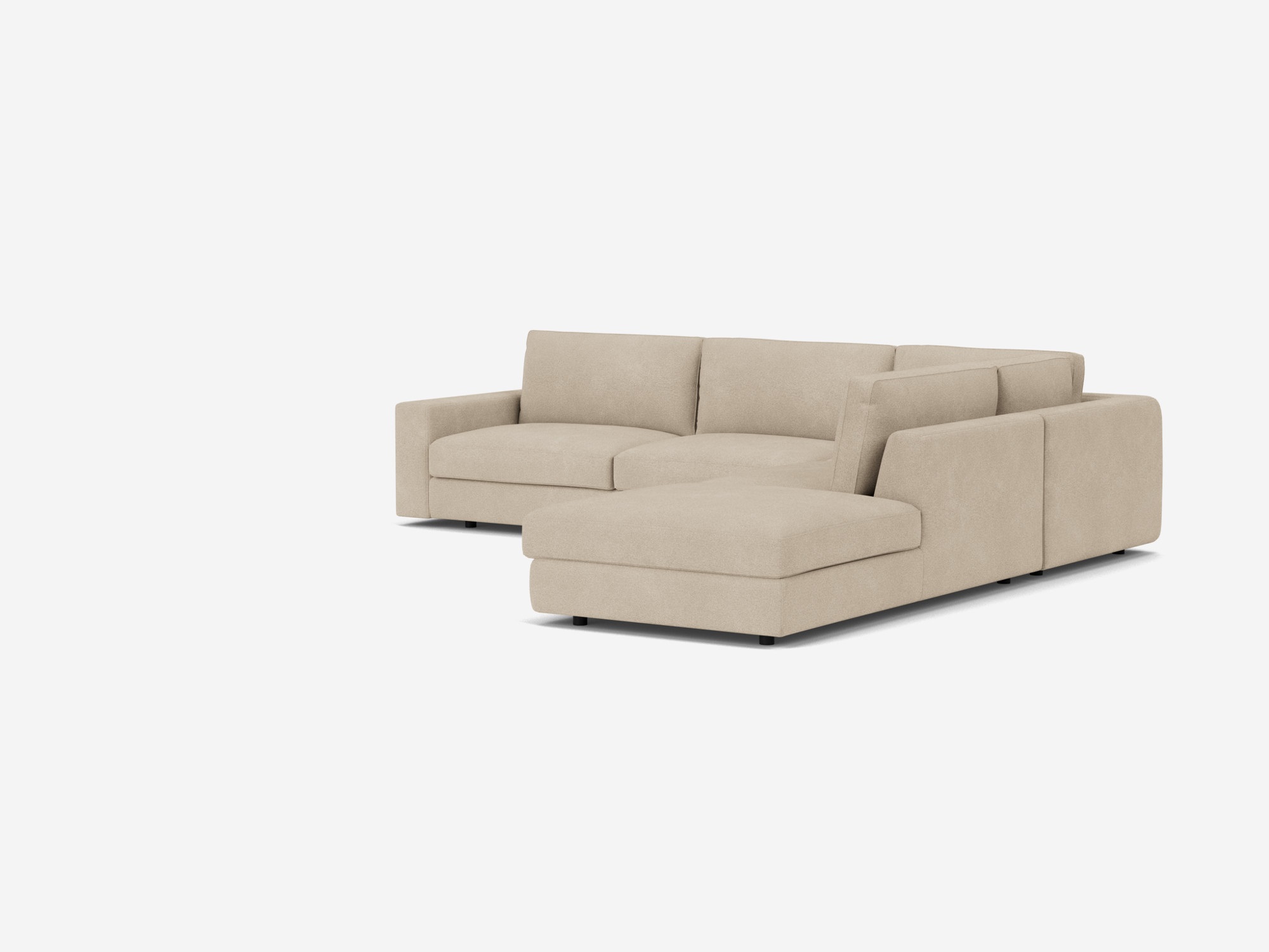 Corner view of the Cello modern sectional couch in light biege fabric with right hand backless chaise