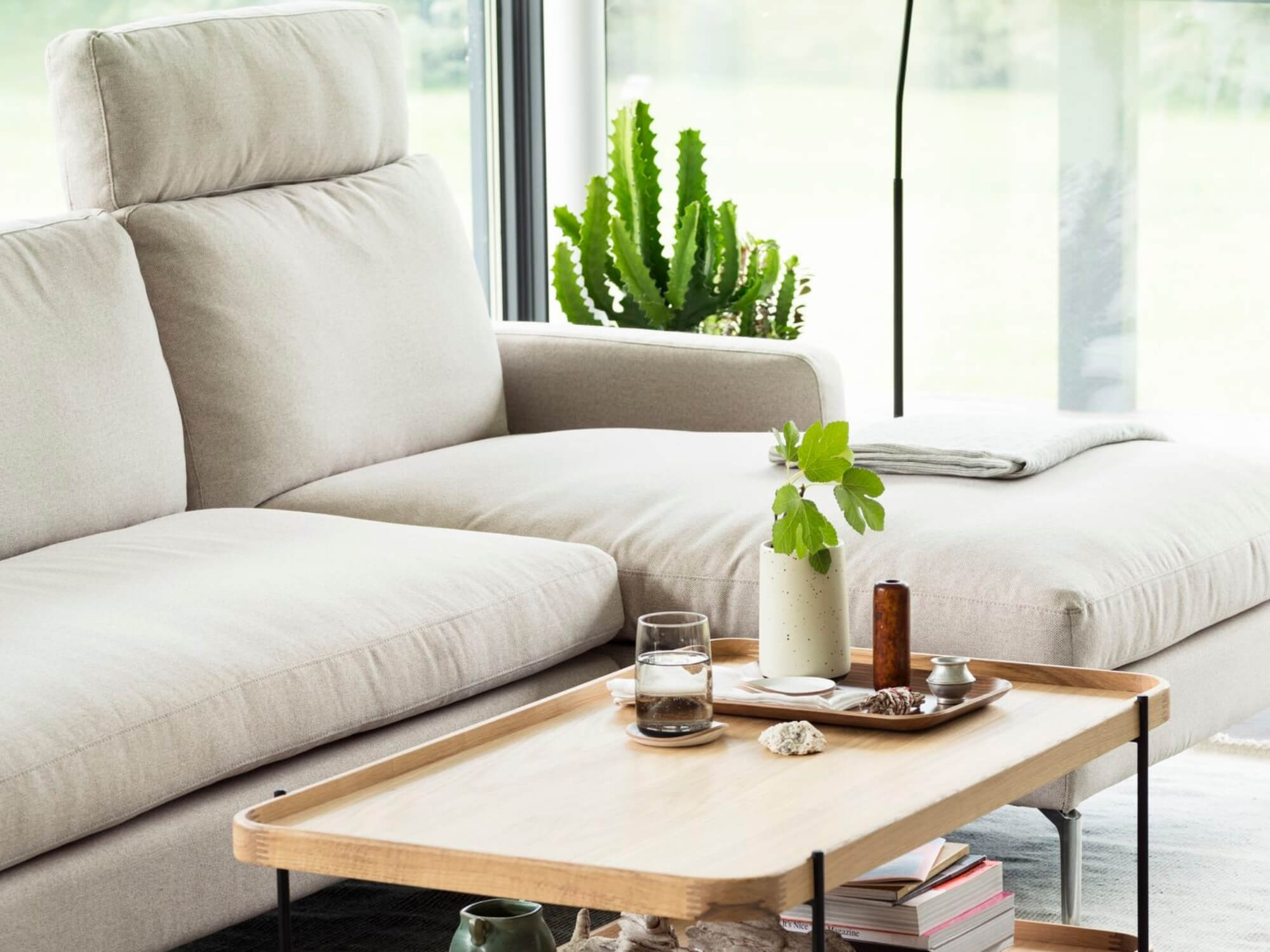 Modern ivory sectional with headrest in living room