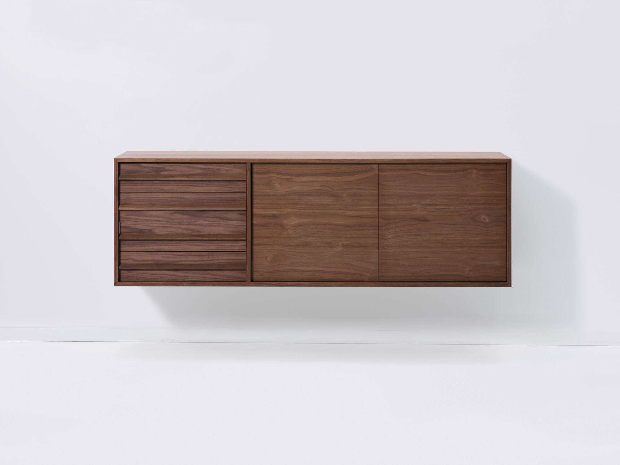 Front view of large walnut mid century floating sideboard