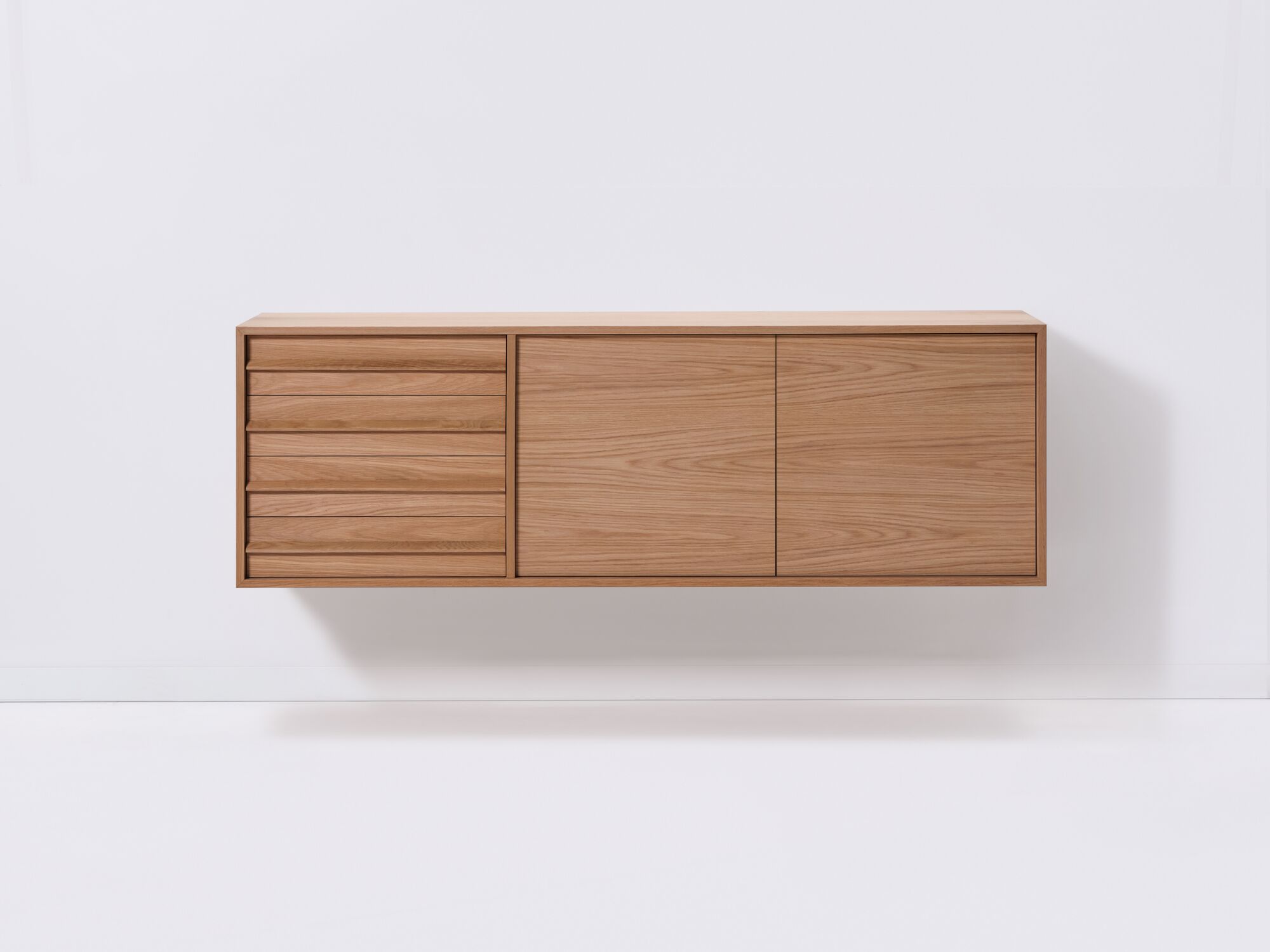 Front view of large oak mid century floating sideboard