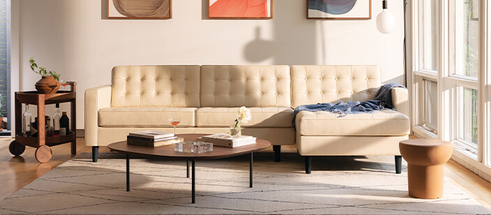 Ivory mid century sectional in modern living space