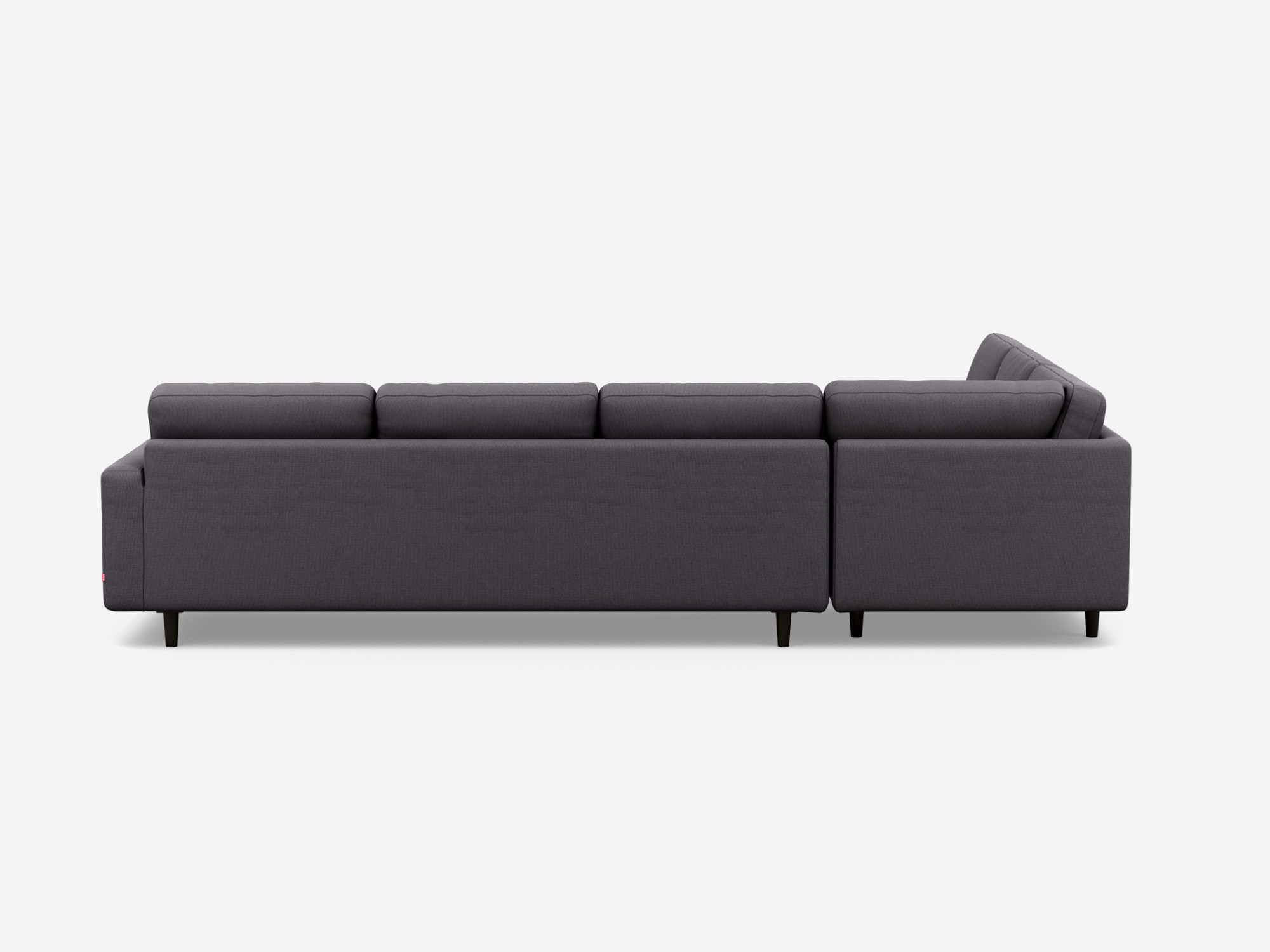 Side view of the Oskar l shape sofa in dark grey fabric.