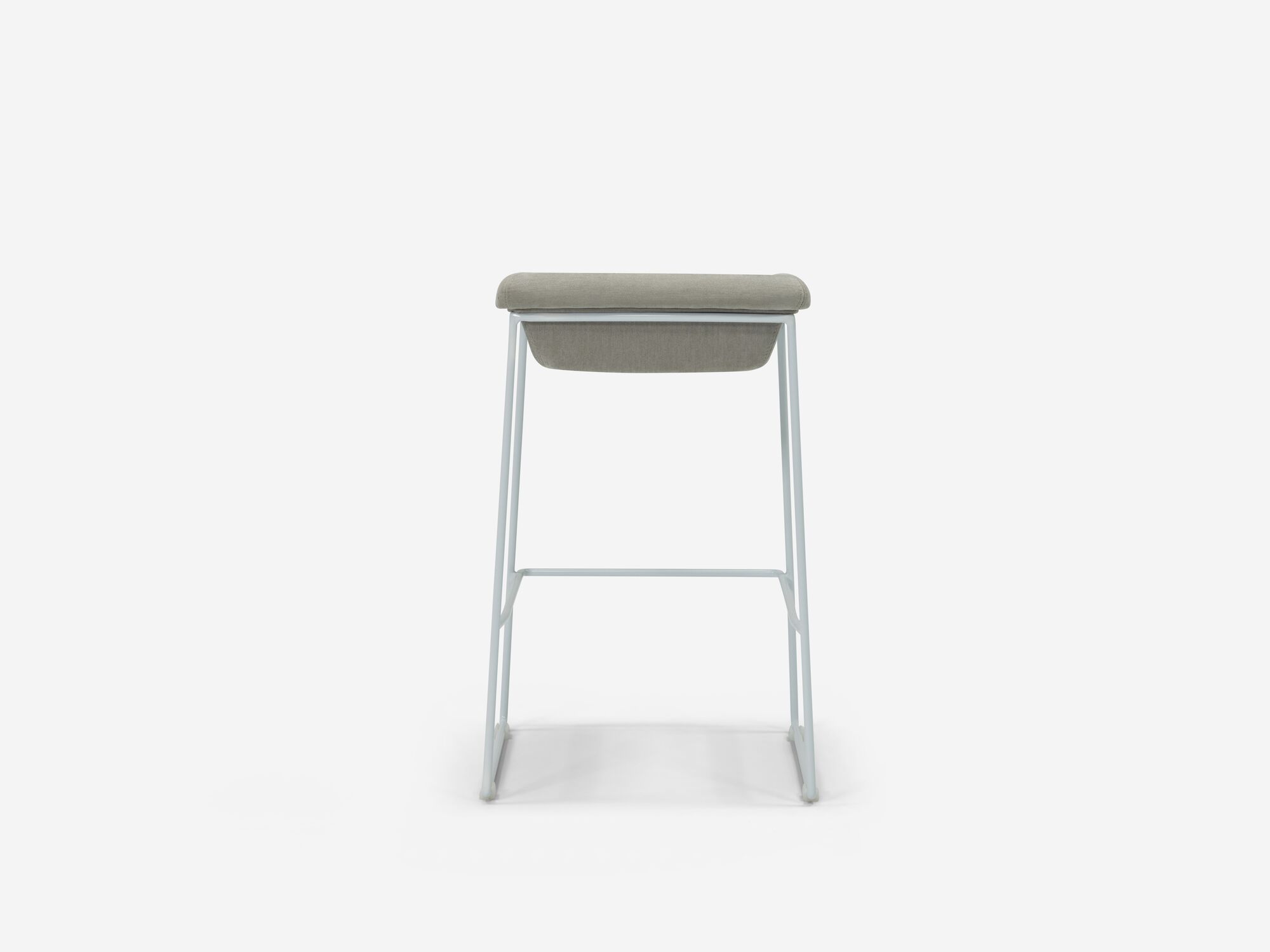 Back view of counter stool with grey seat and white legs