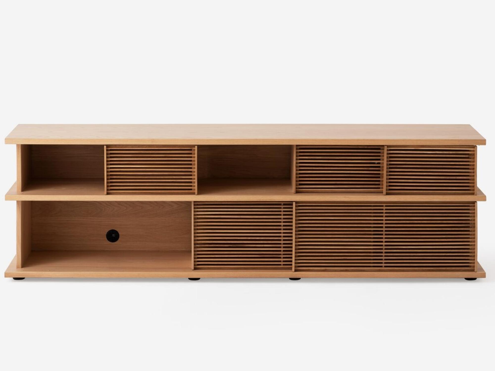 Front view of the Plank tall modern media console in oak with open drawers and slats