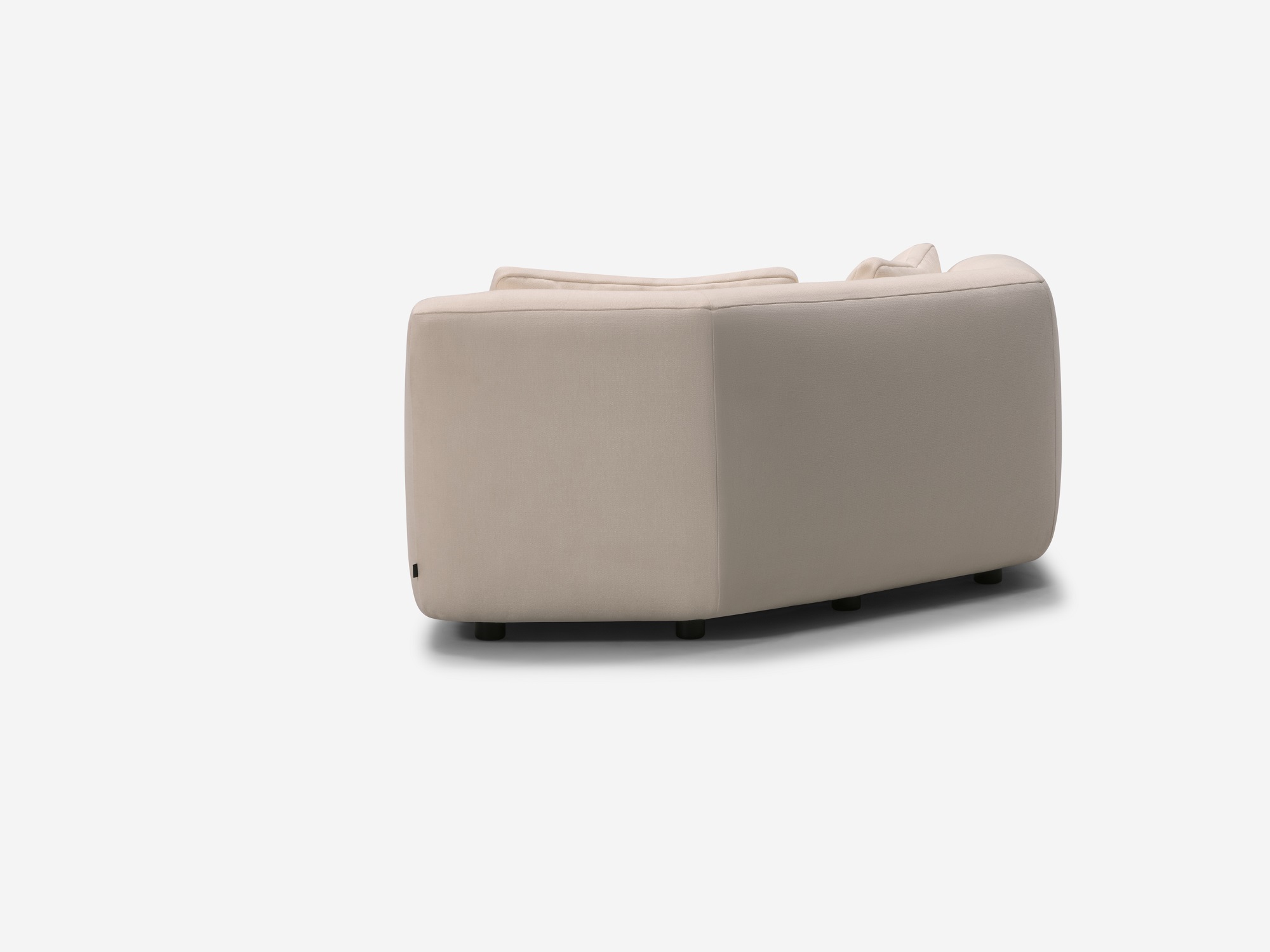 Back angle view of beige rounded corner chair