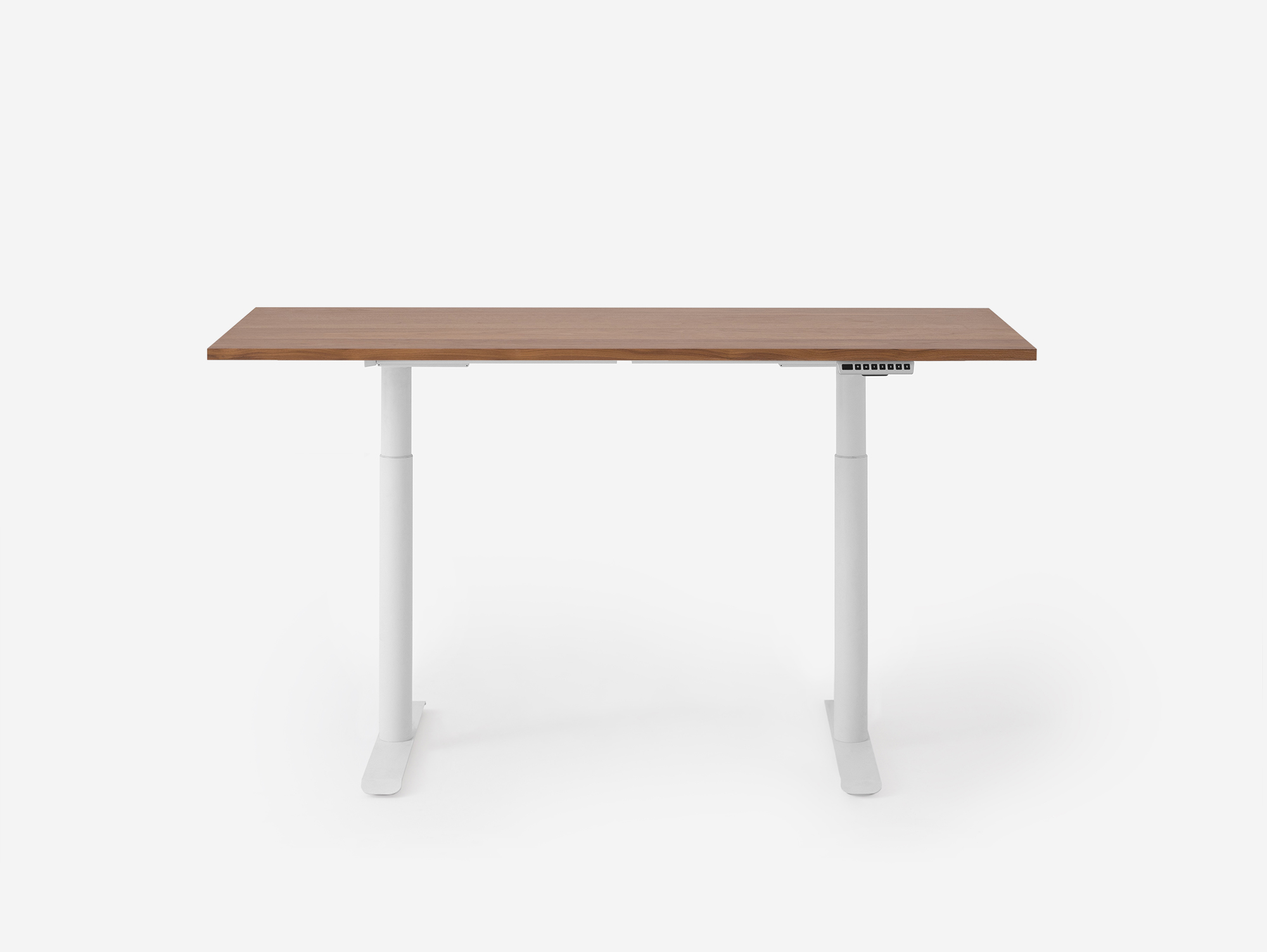 Walnut and white standing desk in mid position