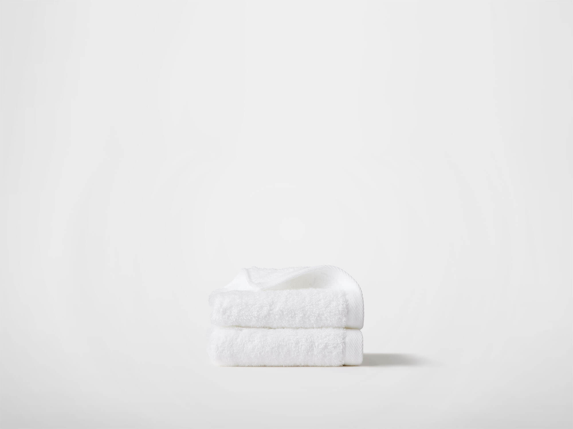 Side view of white washcloths