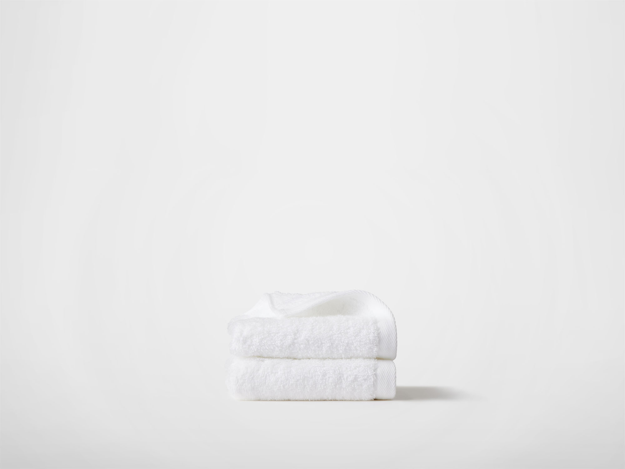 Side view of white washcloths