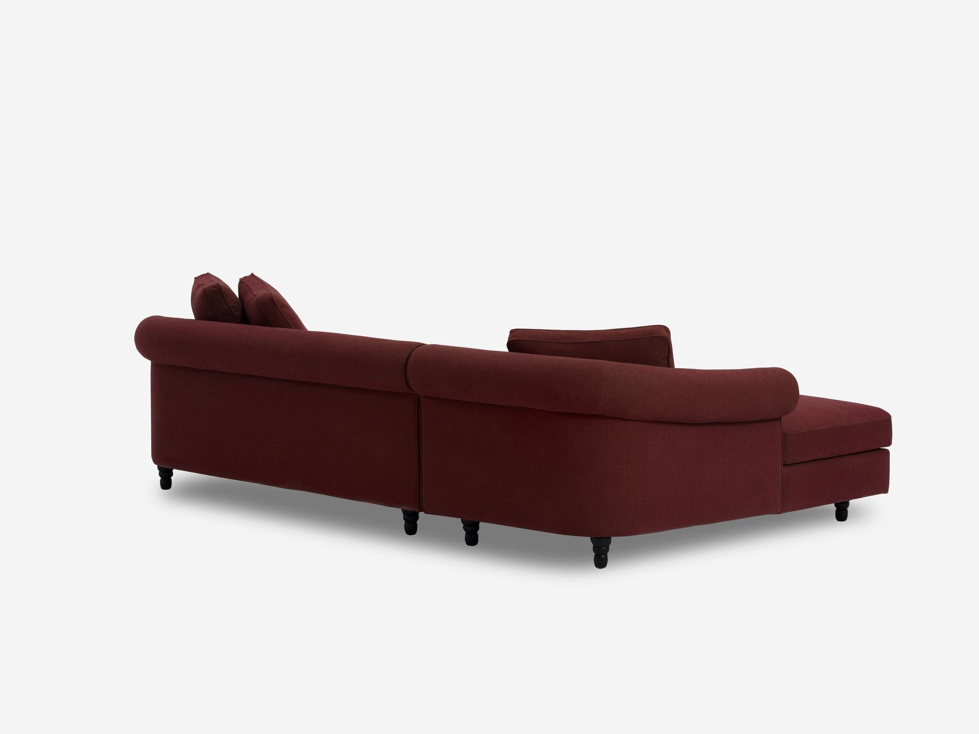 Deep red modern left hand facing sectional sofa back angled view