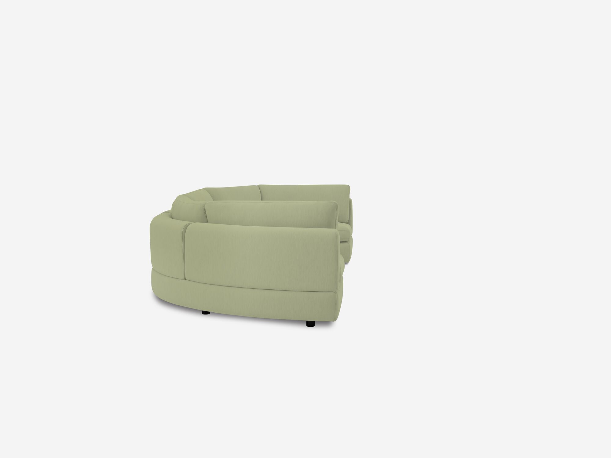 Side view of light green curved sectional sofa