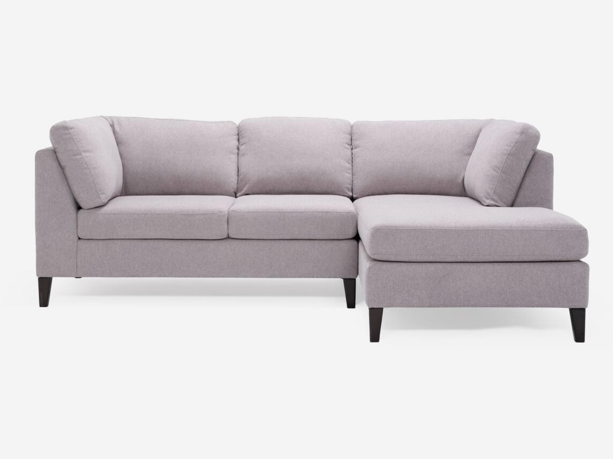 Front view of the Salema modern sectional couch in grey fabric with right hand chaise