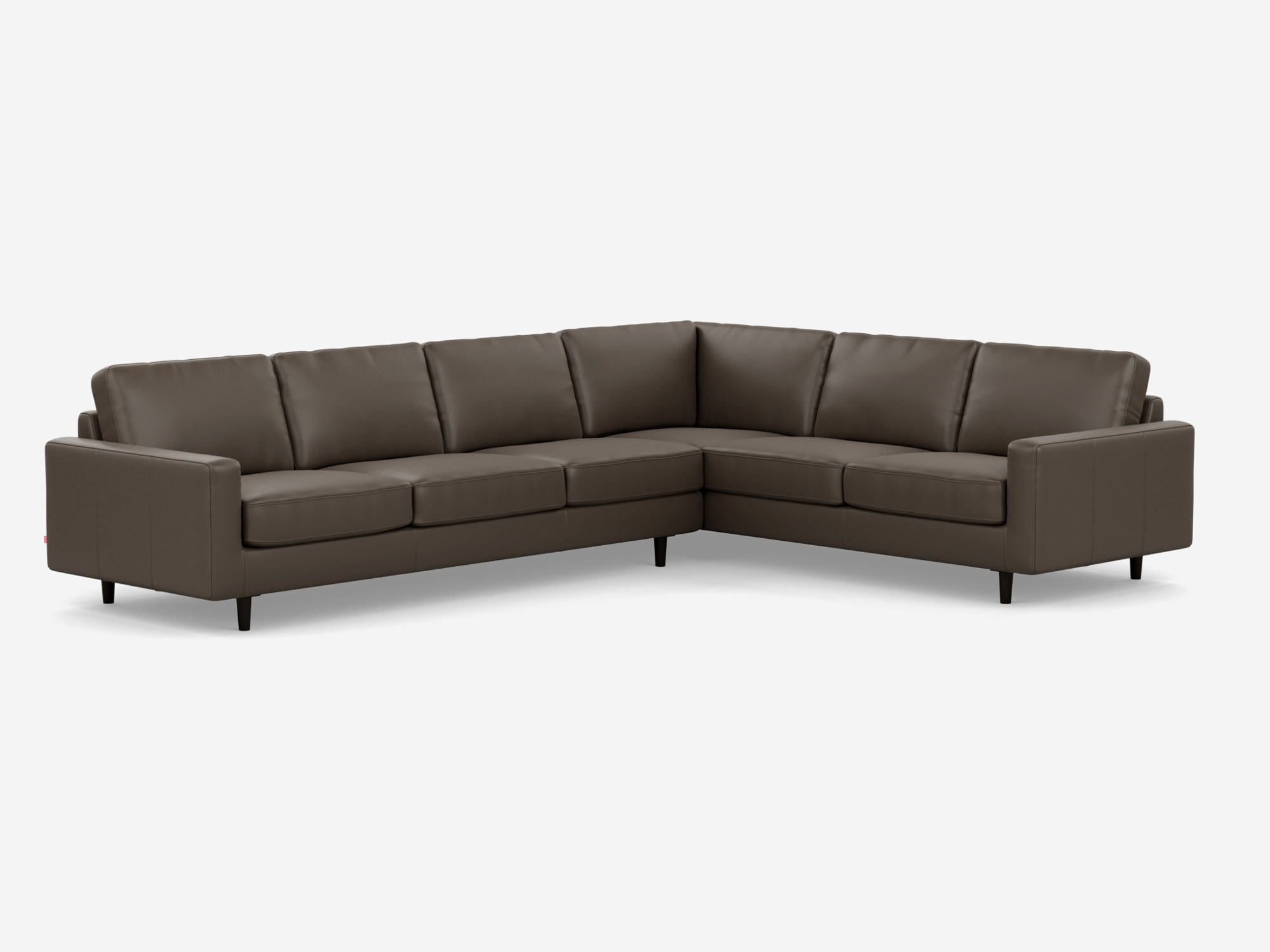 Corner view of the Oskar right hand facing l shape sofa in dark grey leather