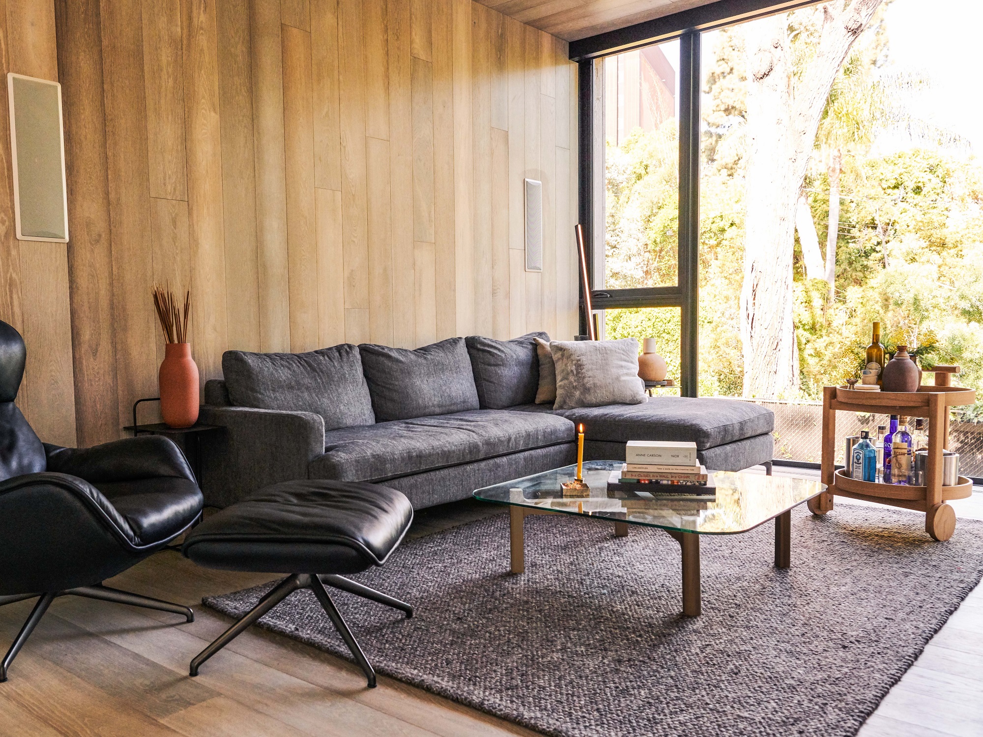 Grey sectional sofa in mid century inspired living room