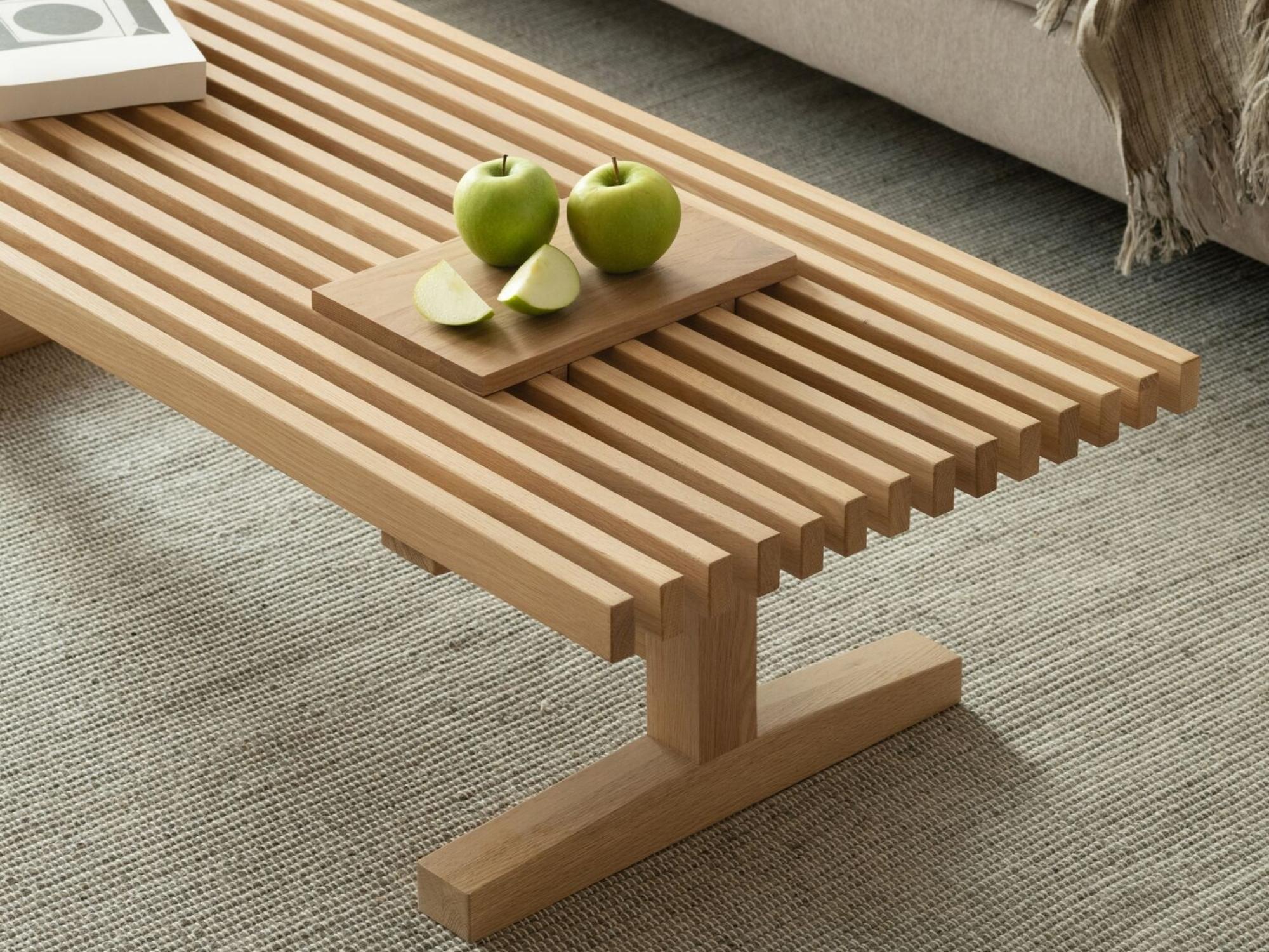 Oak tray with apples on a slatted solid wood coffee table