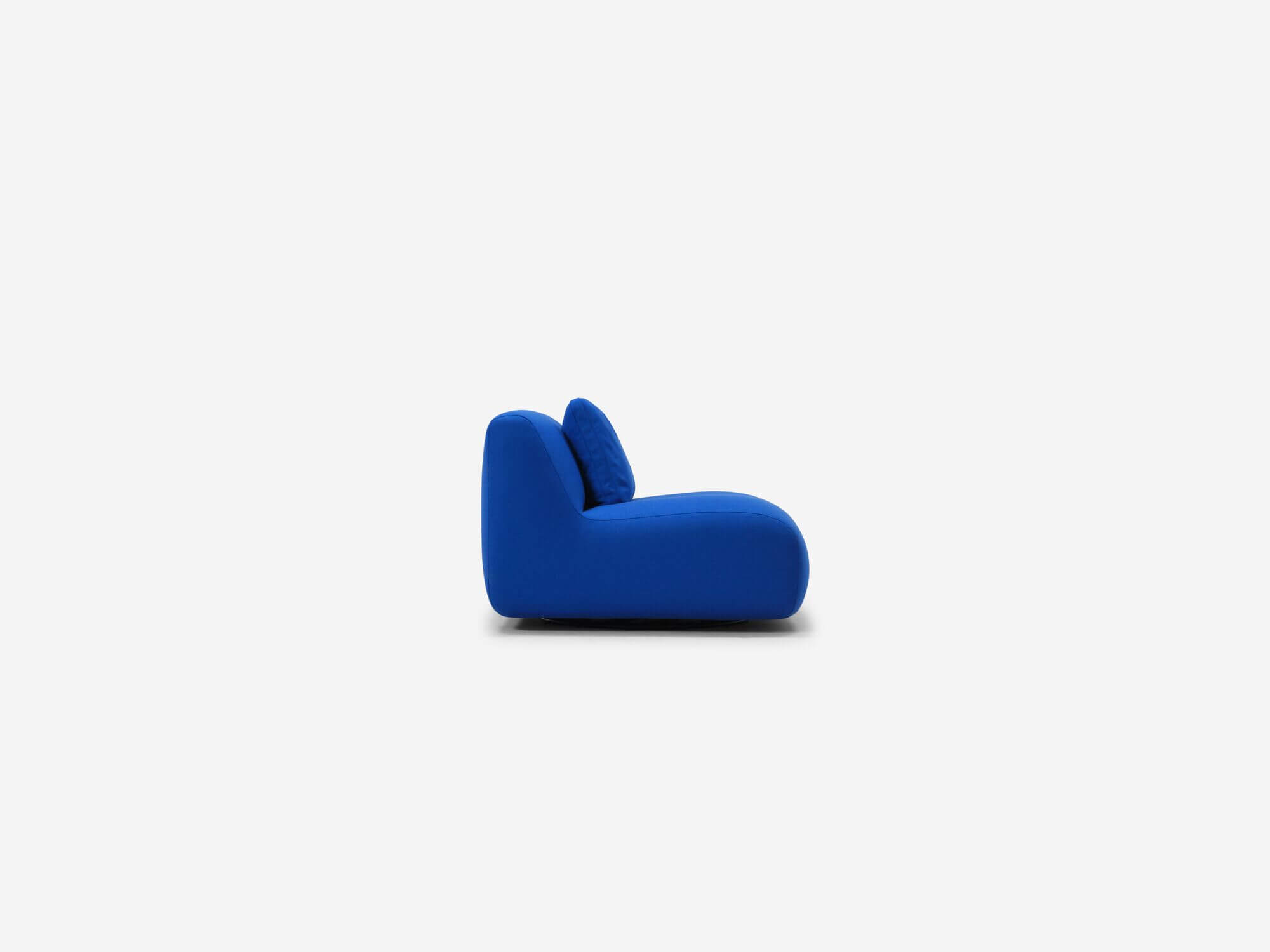 Left side view of bright blue armless swivel chair