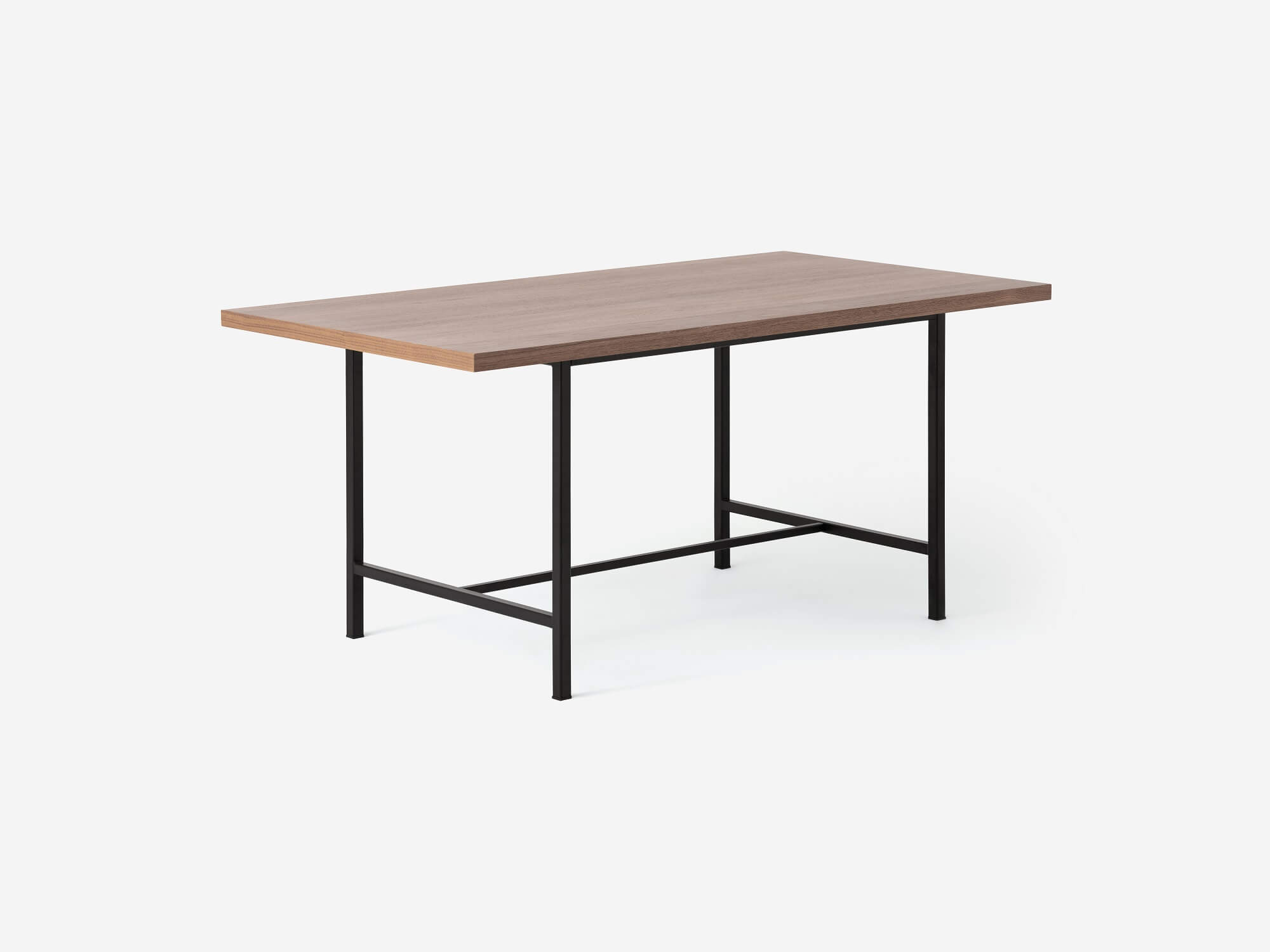 Angled view of the Kendall 66" modern dining table with solid walnut top and black base