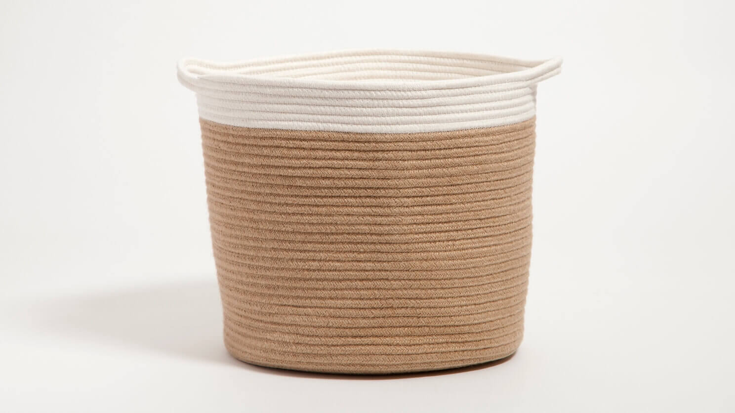 Ivory and cream woven basket with handles back view