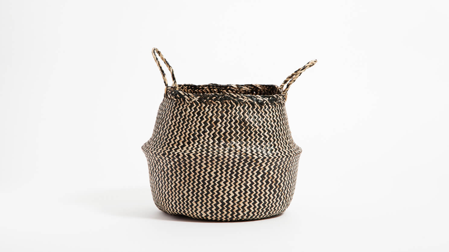 Side view of the small black woven Trundle basket