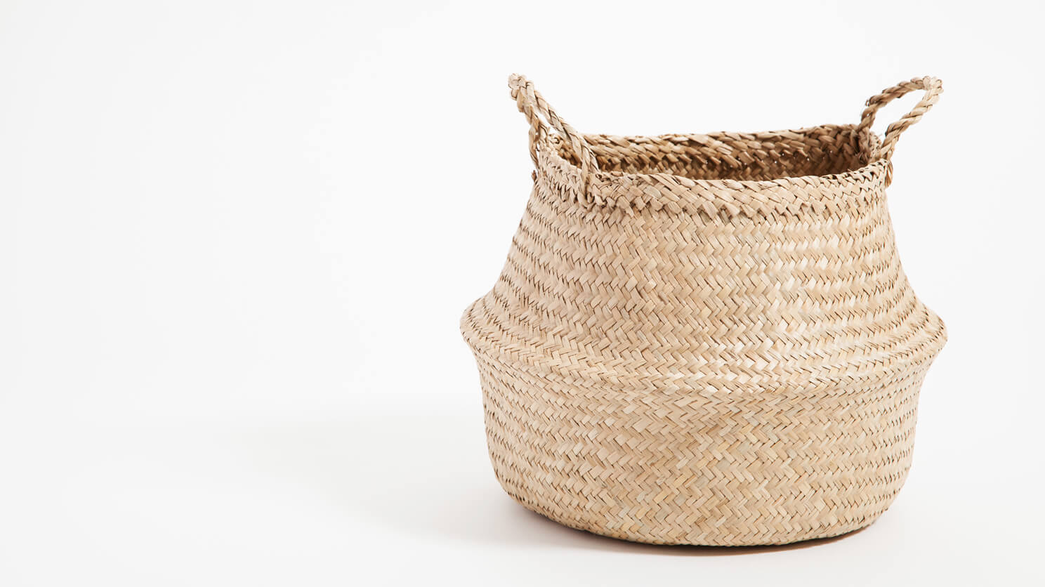 Detail view of the medium beige woven Trundle basket