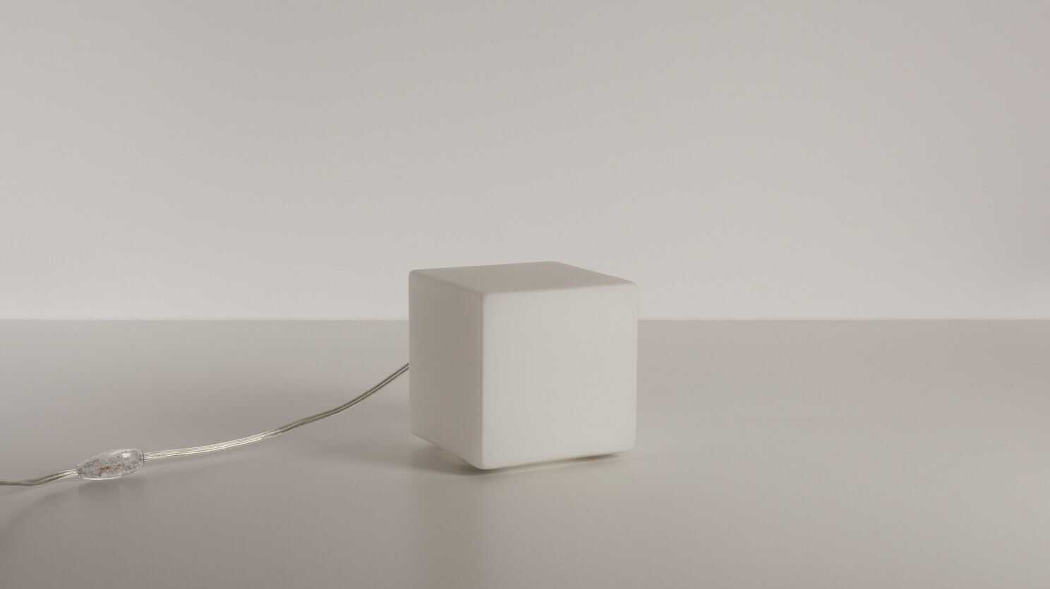 Side view of the small Boxy unique modern table lamp