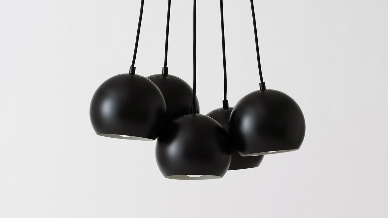 Front view of the 5 ball kitchen island pendant lighting in black
