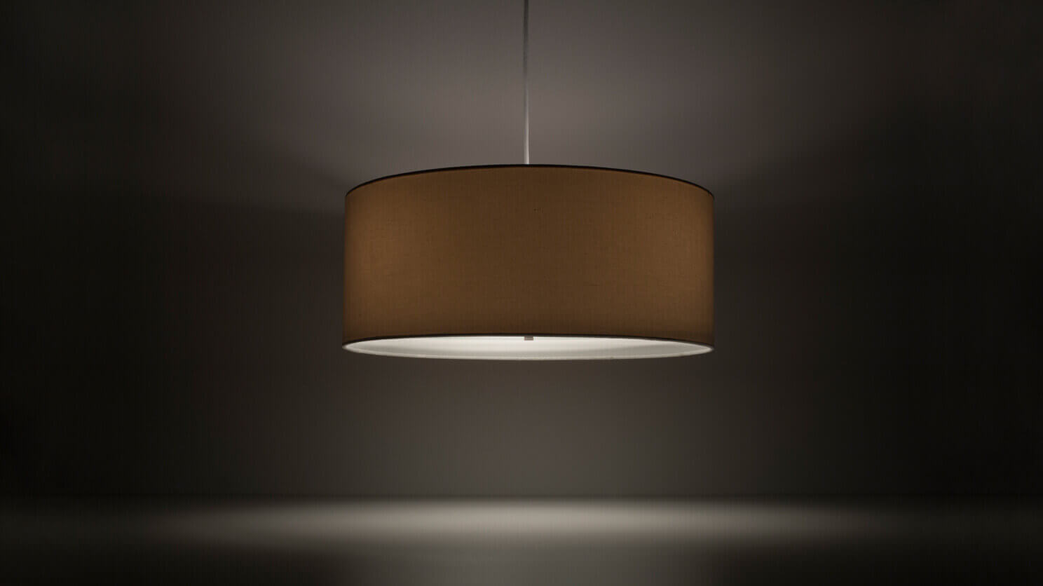 Front view of the Conick modern pendant lighting with light on