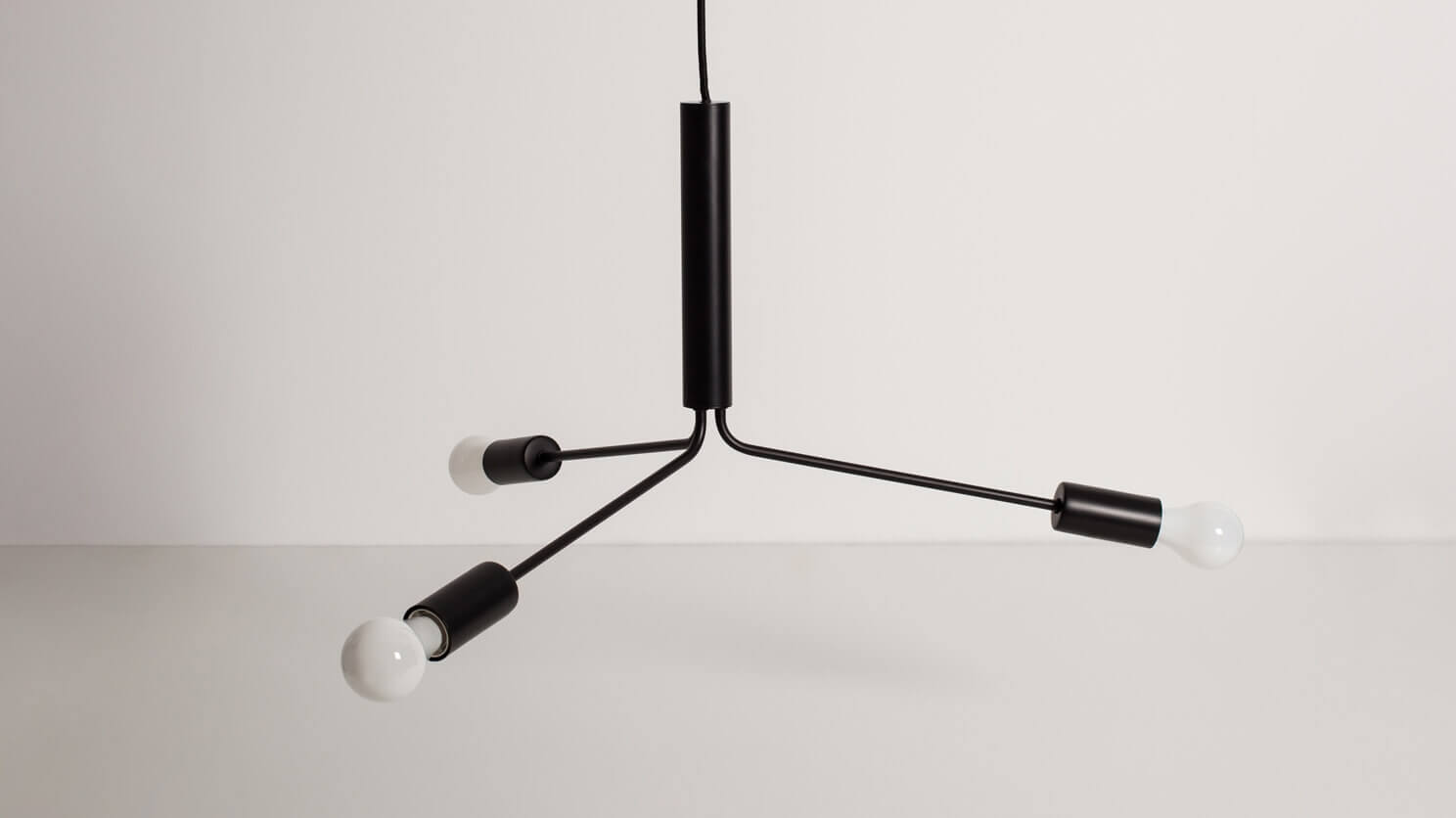 Front view of the Grand Metro modern pendant lamp in black