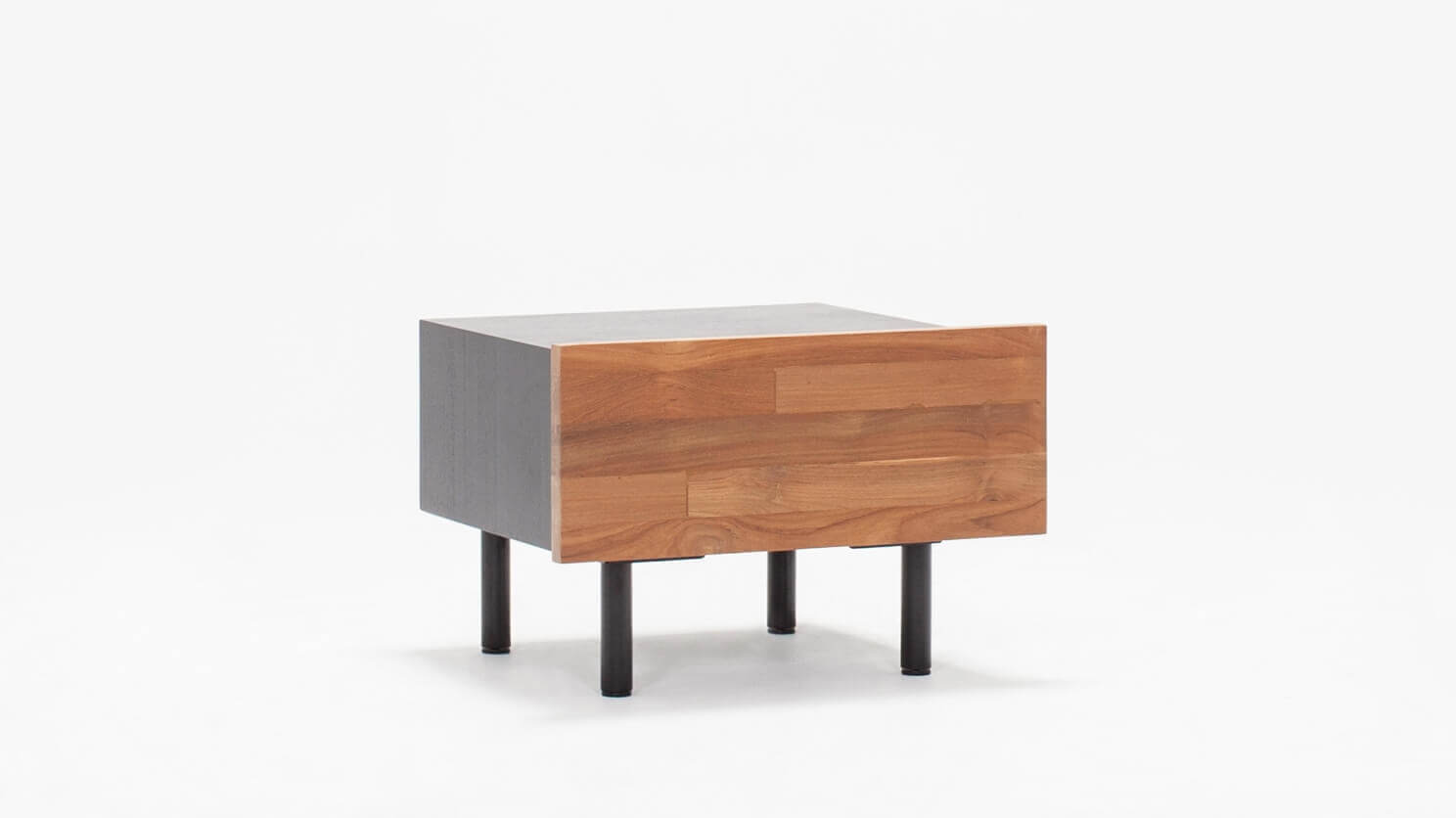 Angled view of the Reclaimed modern teak nightstand with black case