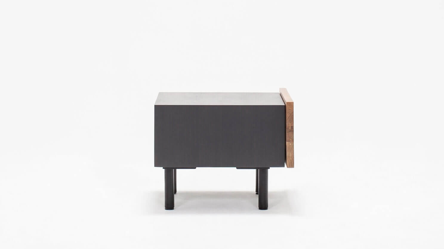 Side view of the Reclaimed modern teak nightstand with black case