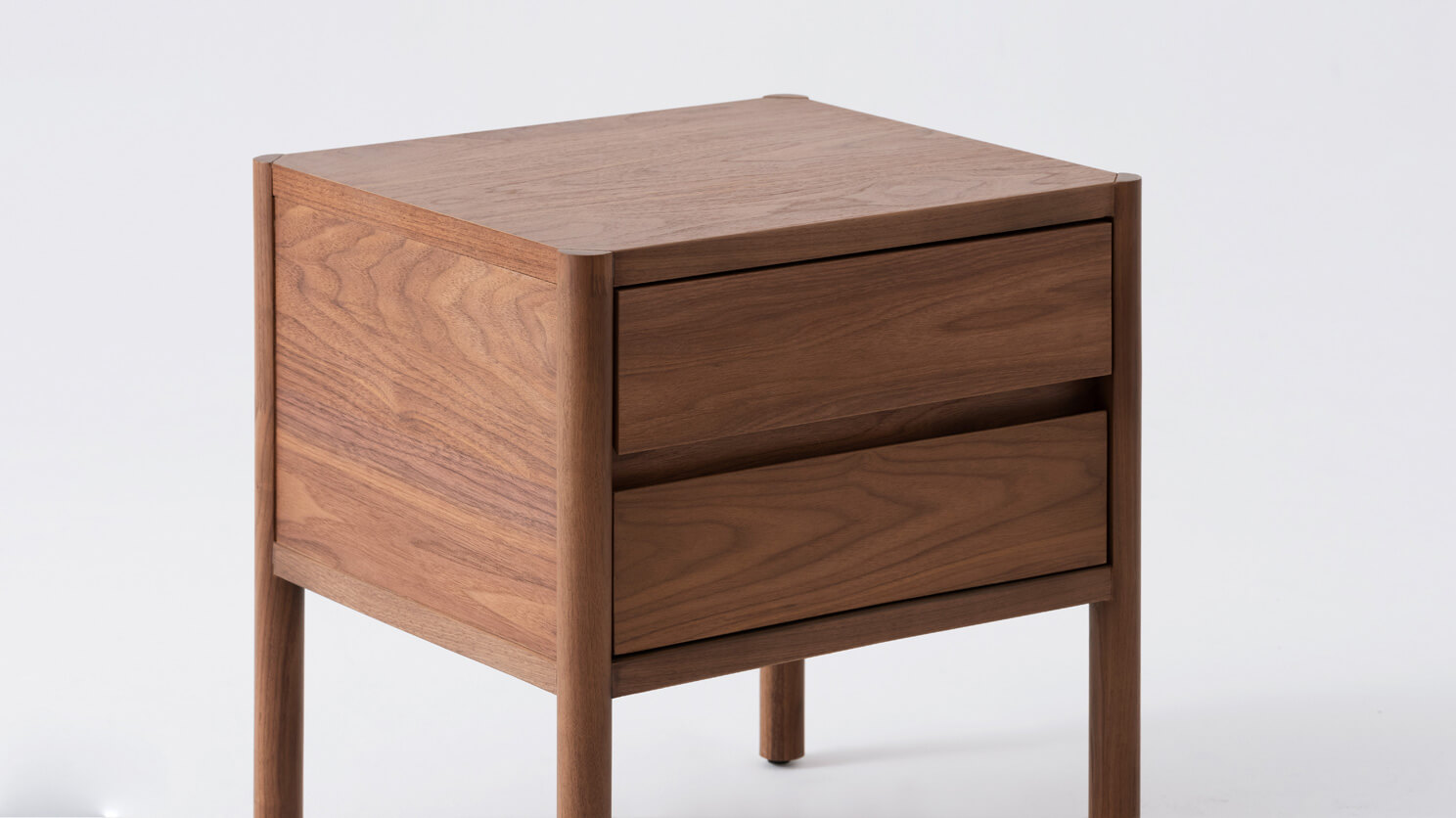 Double drawer nightstand in walnut detail view