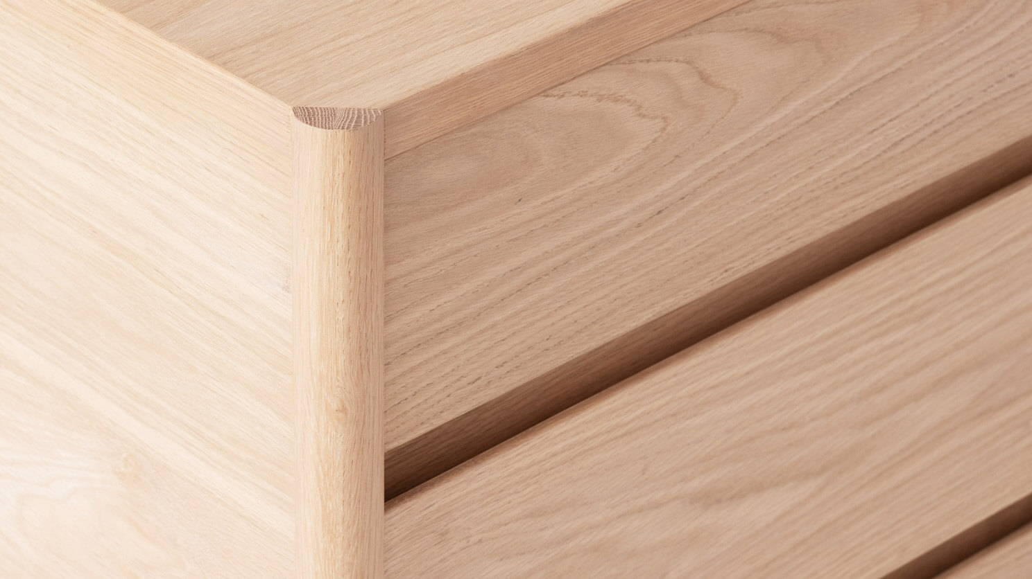 Detail view of the Monarch bedroom chest in oak