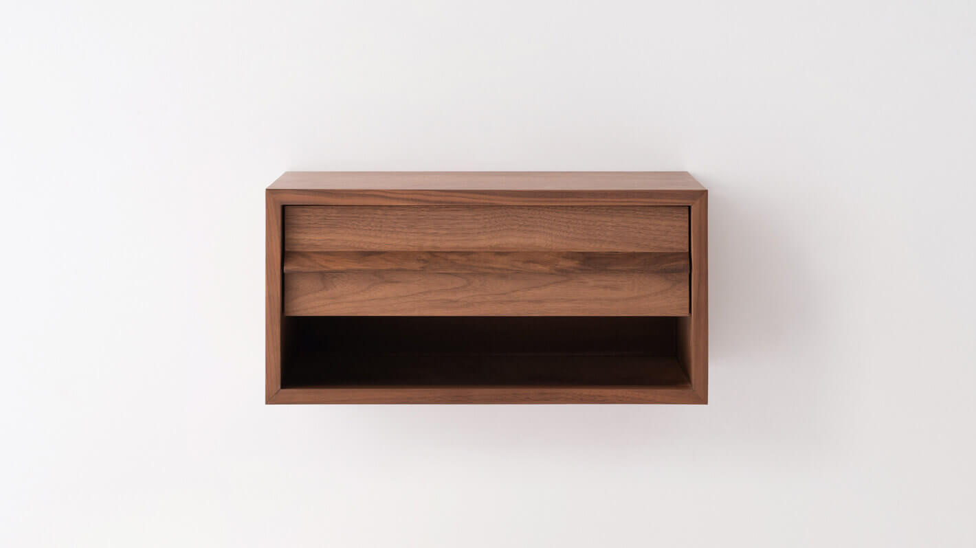 Front view of the Marcel open shelf floating nightstand in walnut