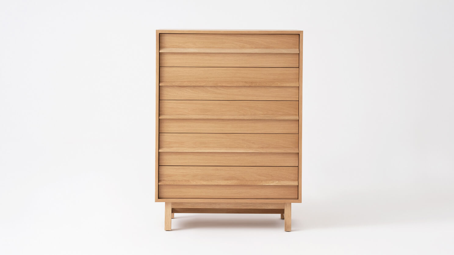 Front view of the Marcel bedroom chest in oak