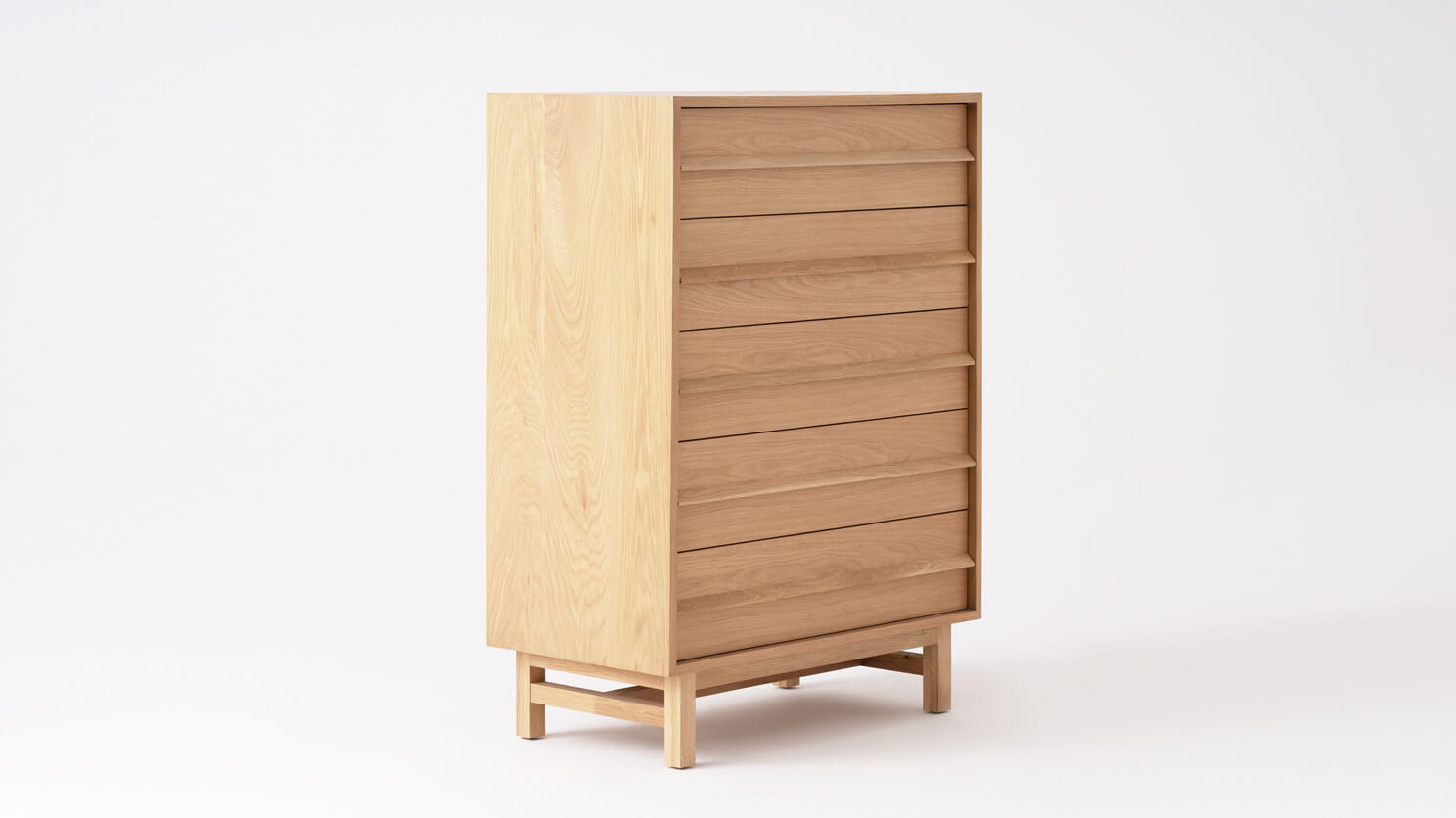 Angled view of the Marcel bedroom chest in oak