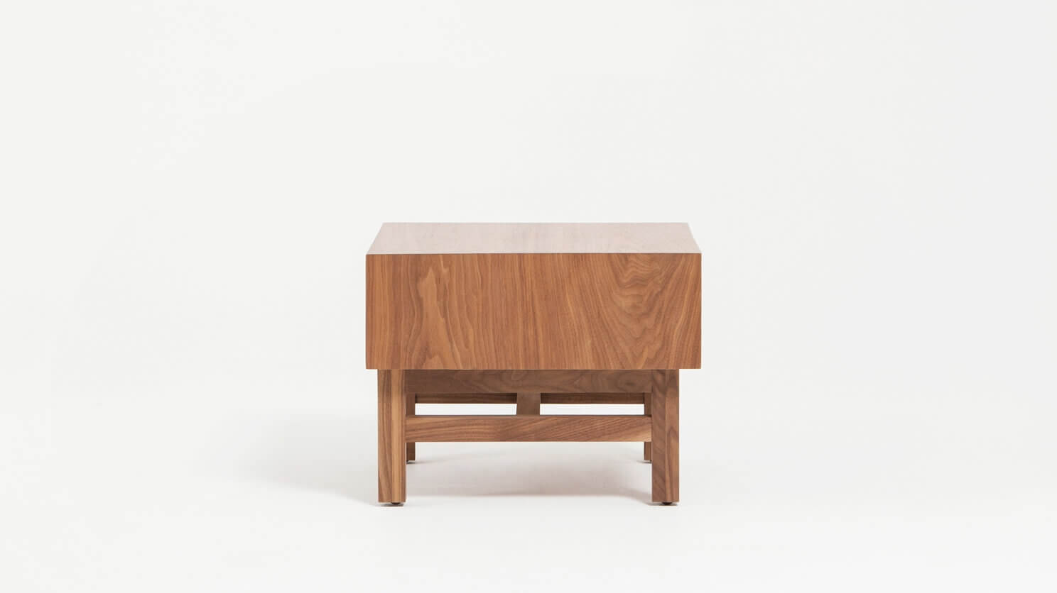 Side view of the Marcel nightstand in walnut