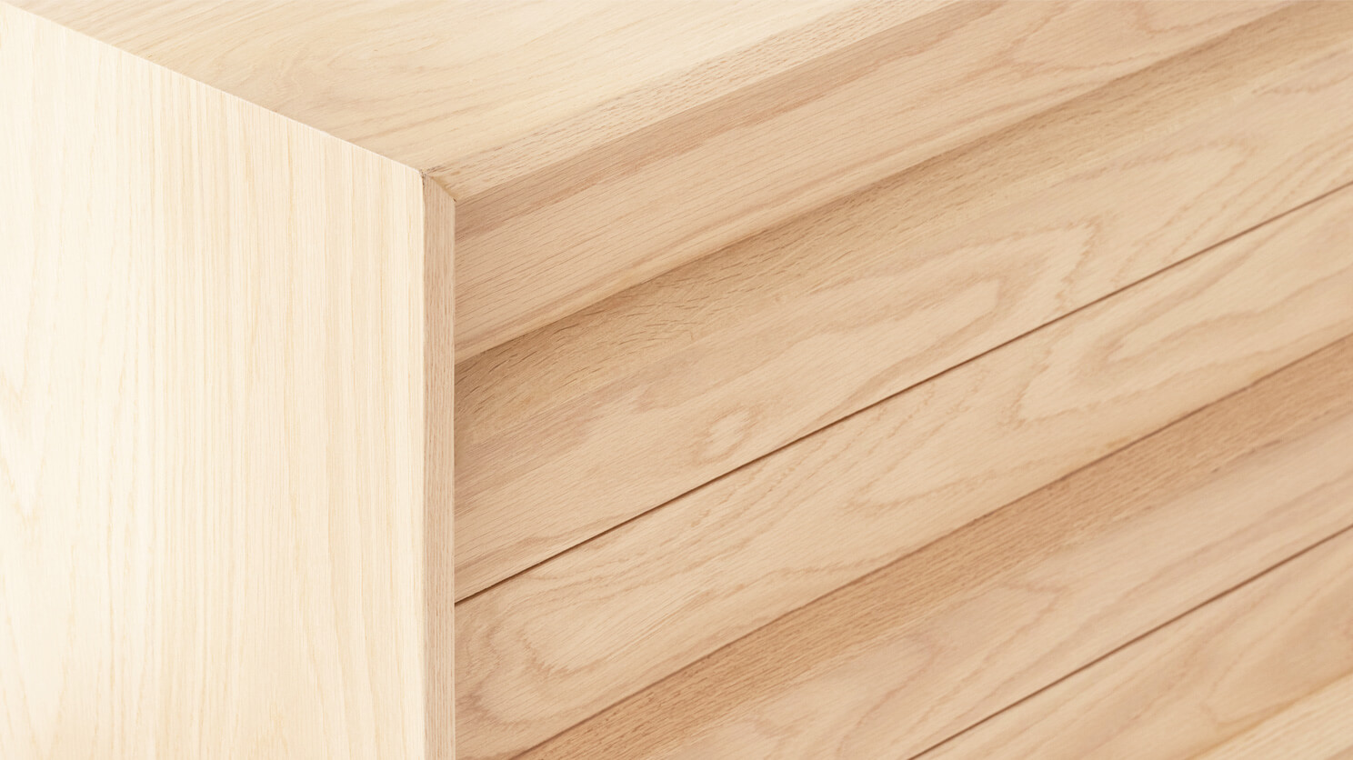 Detail view of the Marcel mid century dresser in oak