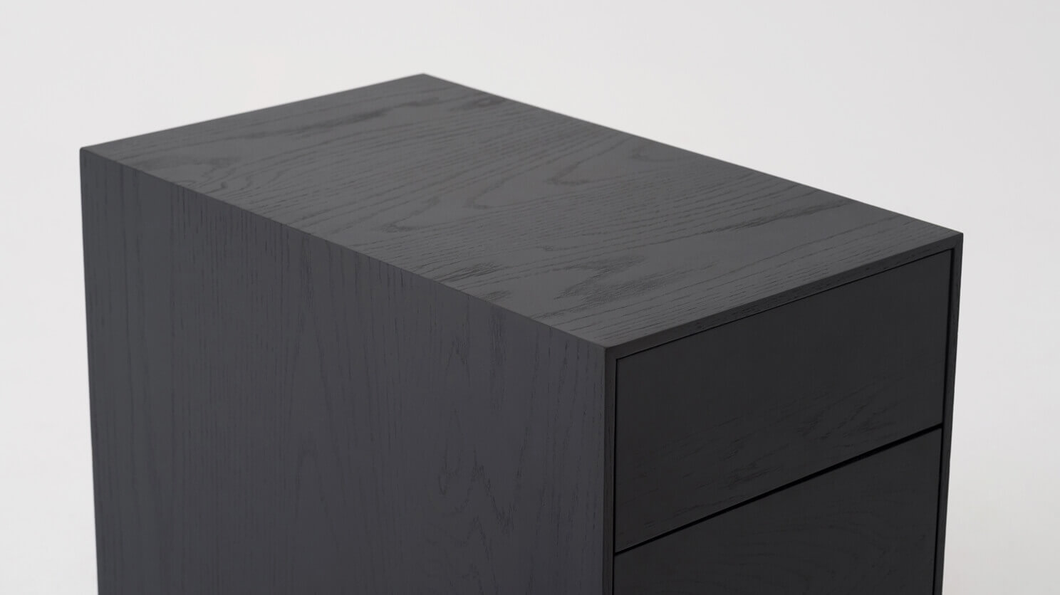 Black oak filing cabinet top detail view