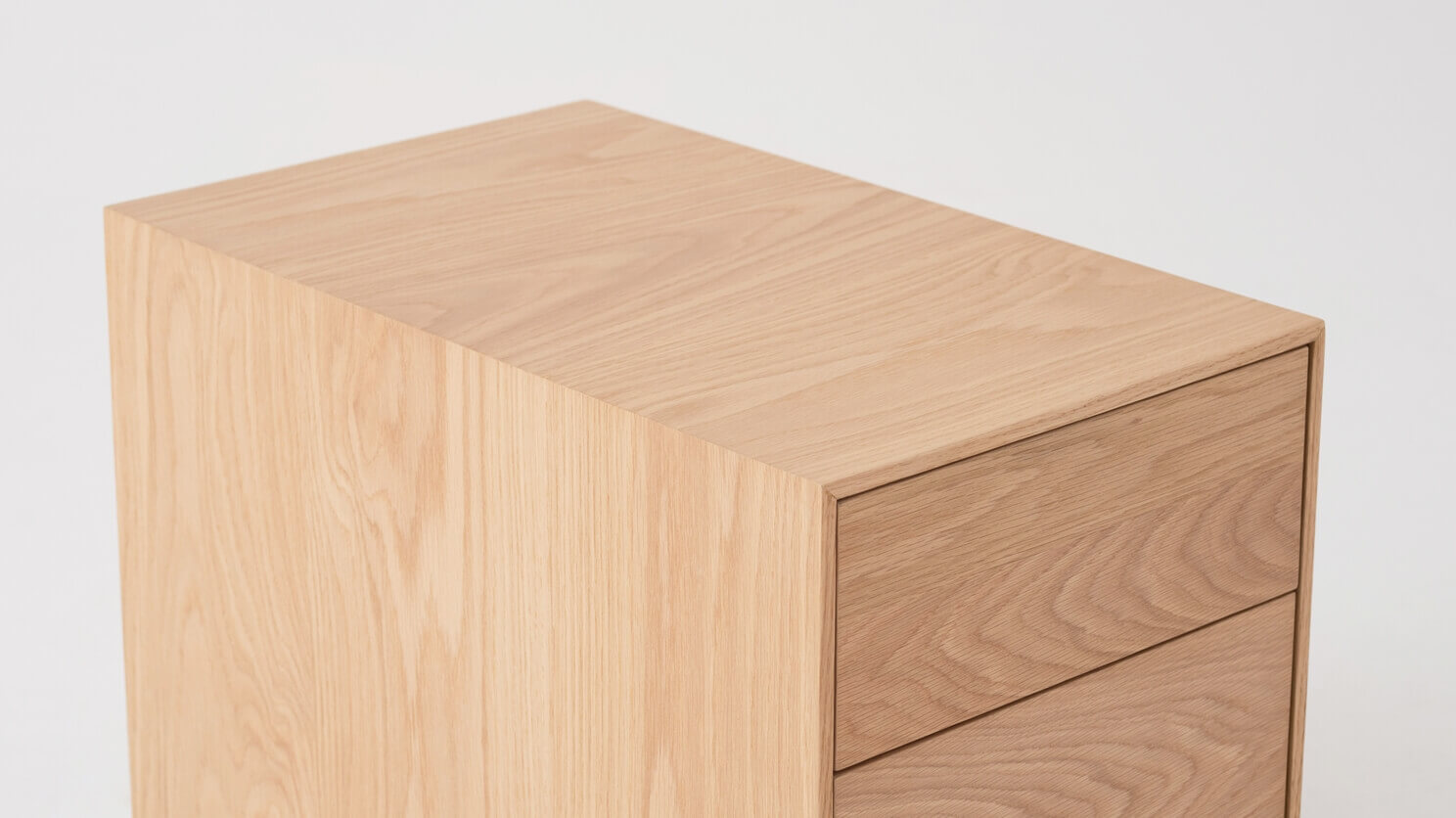 Top detail view of oak filing cabinet