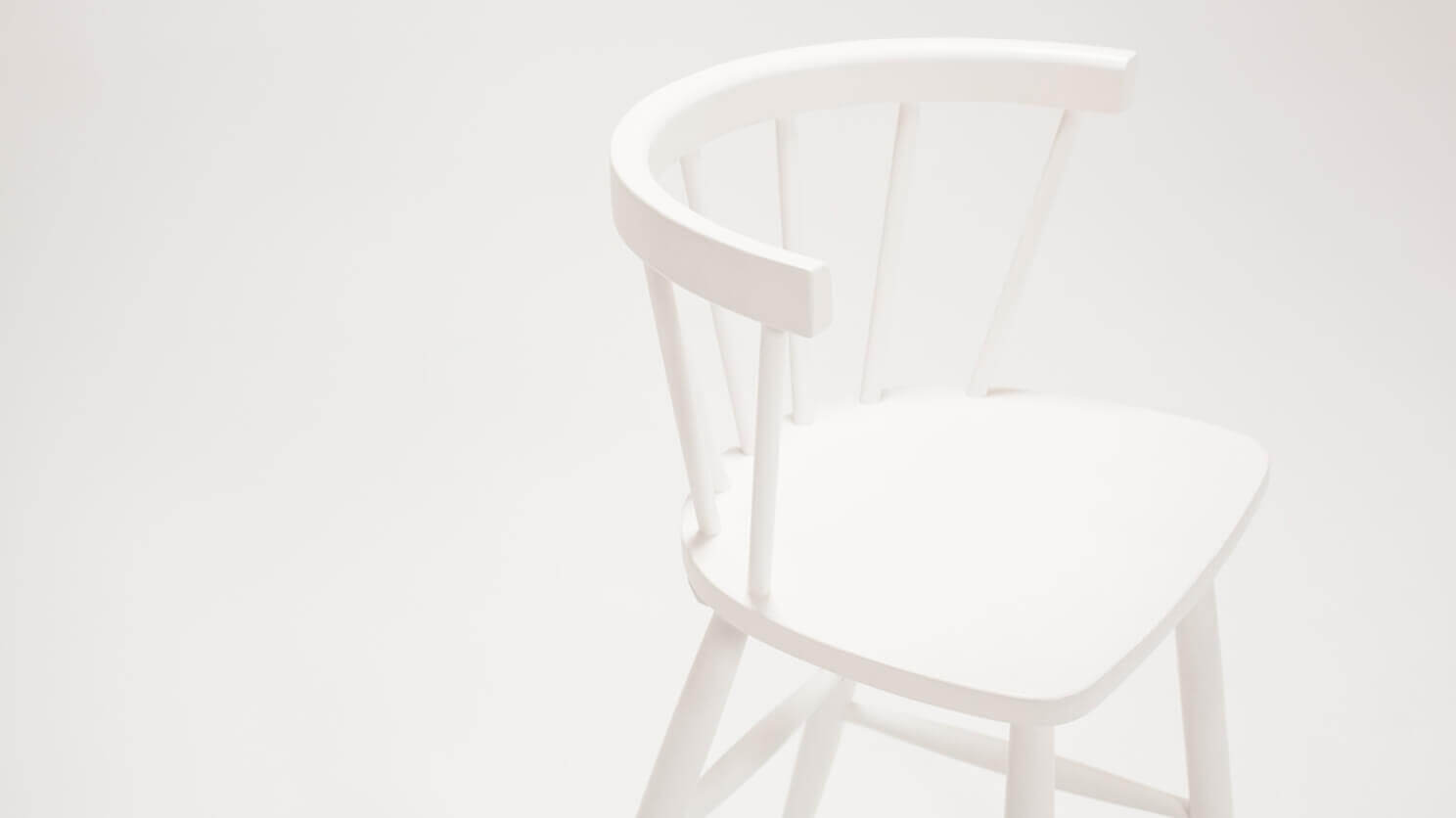 Detail angled view of the Lyla modern arm counter stool in white