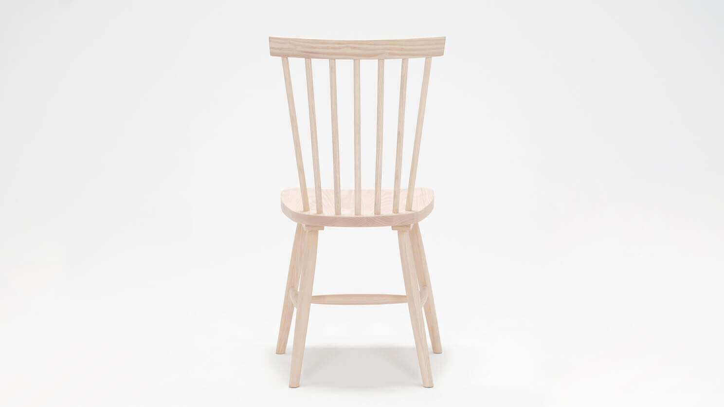 Back view of the Lyla modern side dining room chair in solid ash