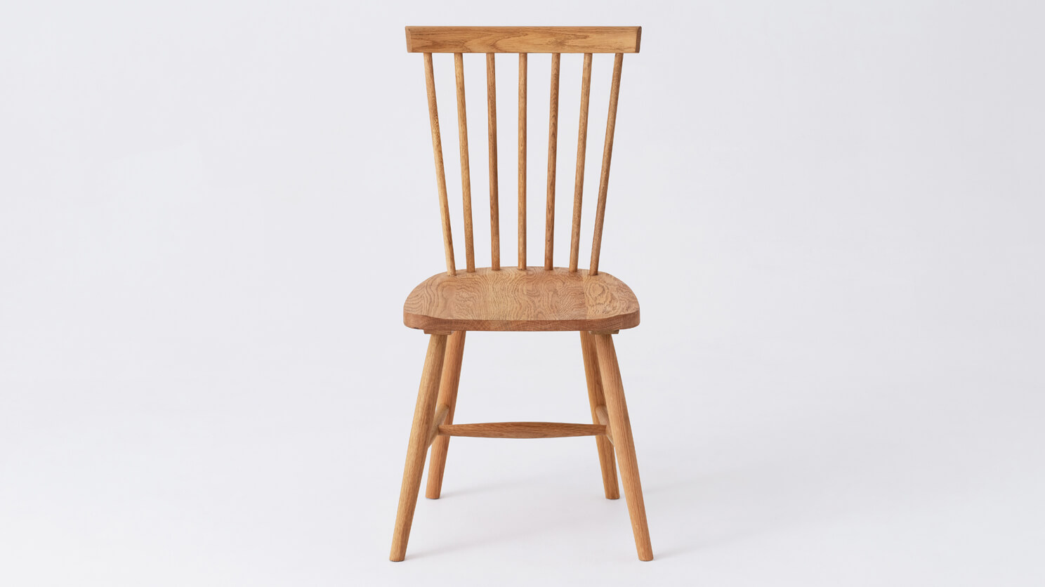 Front view of the Lyla modern side dining room chair in solid oak