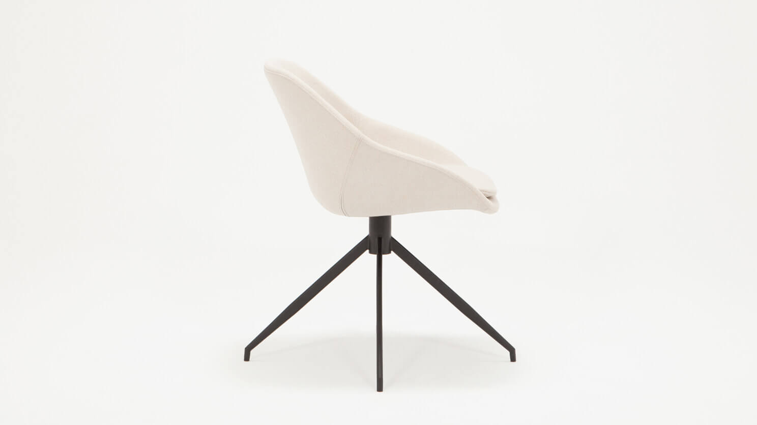 Side view of the Nixon upholstered dining chair in white fabric