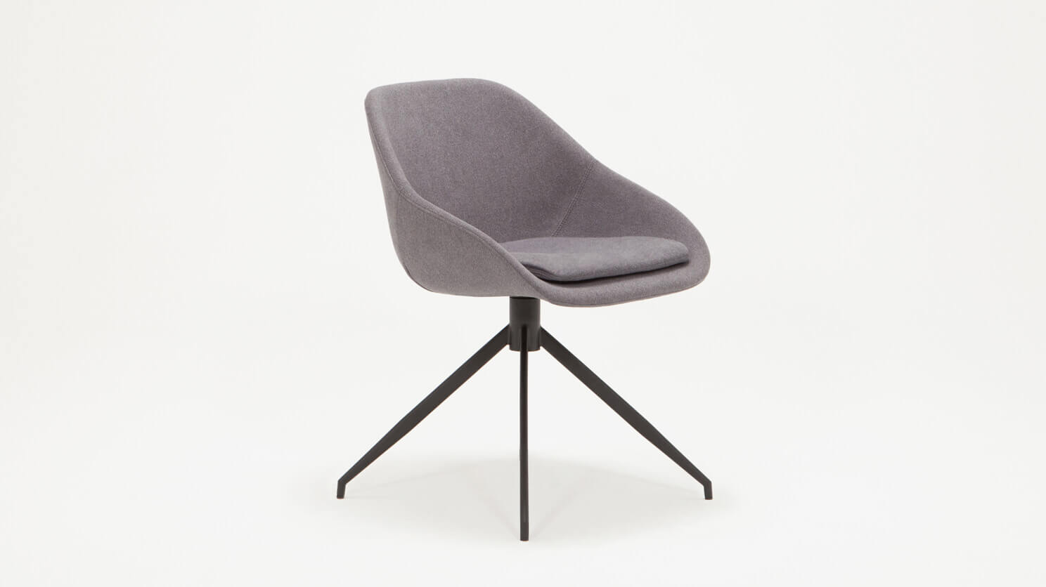 Front angled view of the Nixon upholstered dining chair in gray fabric